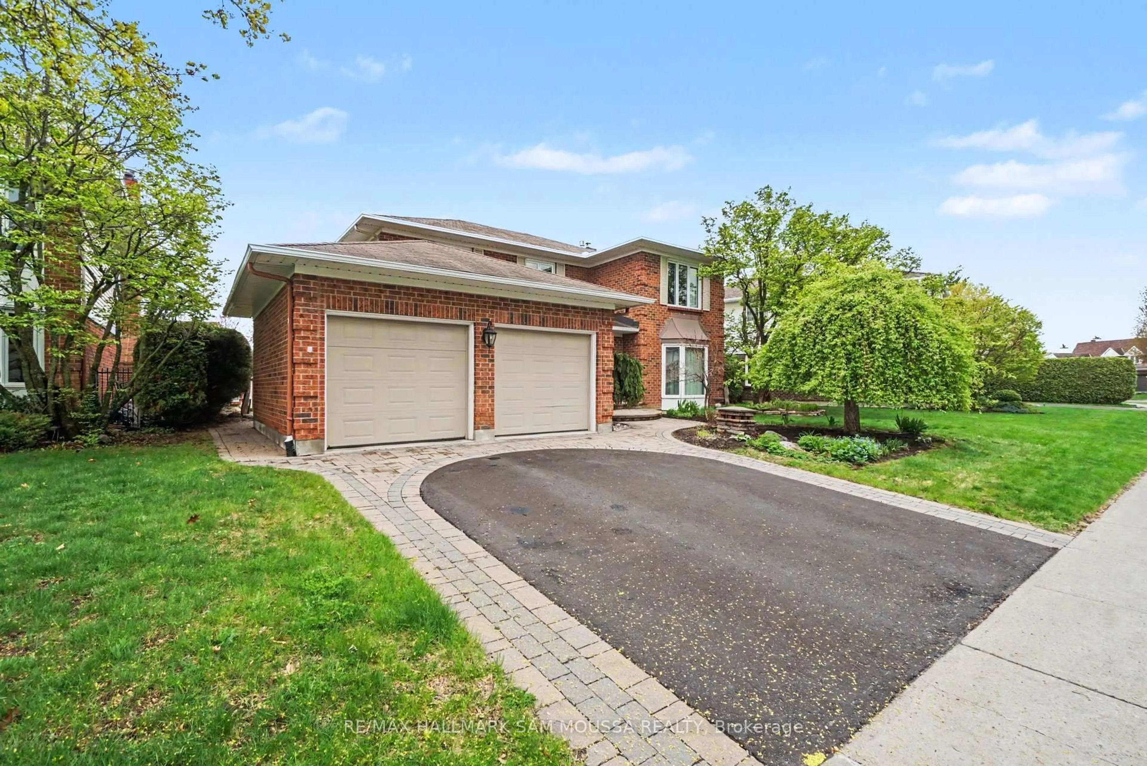 Home with brick exterior material, street for 6115 Voyageur Dr, Orleans Ontario K1C 2X5