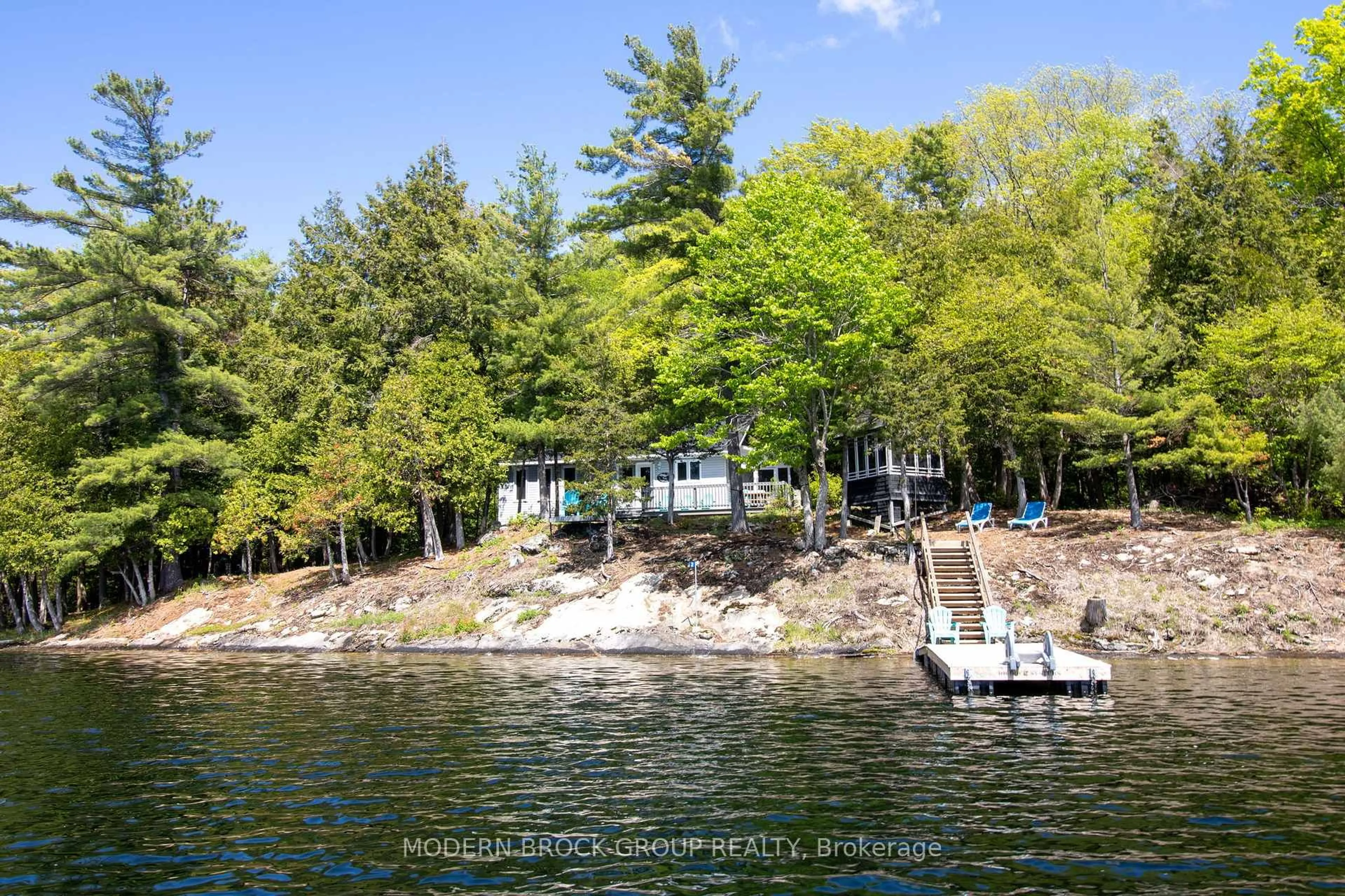 A pic from outside/outdoor area/front of a property/back of a property/a pic from drone, water/lake/river/ocean view for 32 Buck Island, Leeds and the Thousand Islands Ontario K0E 1B0