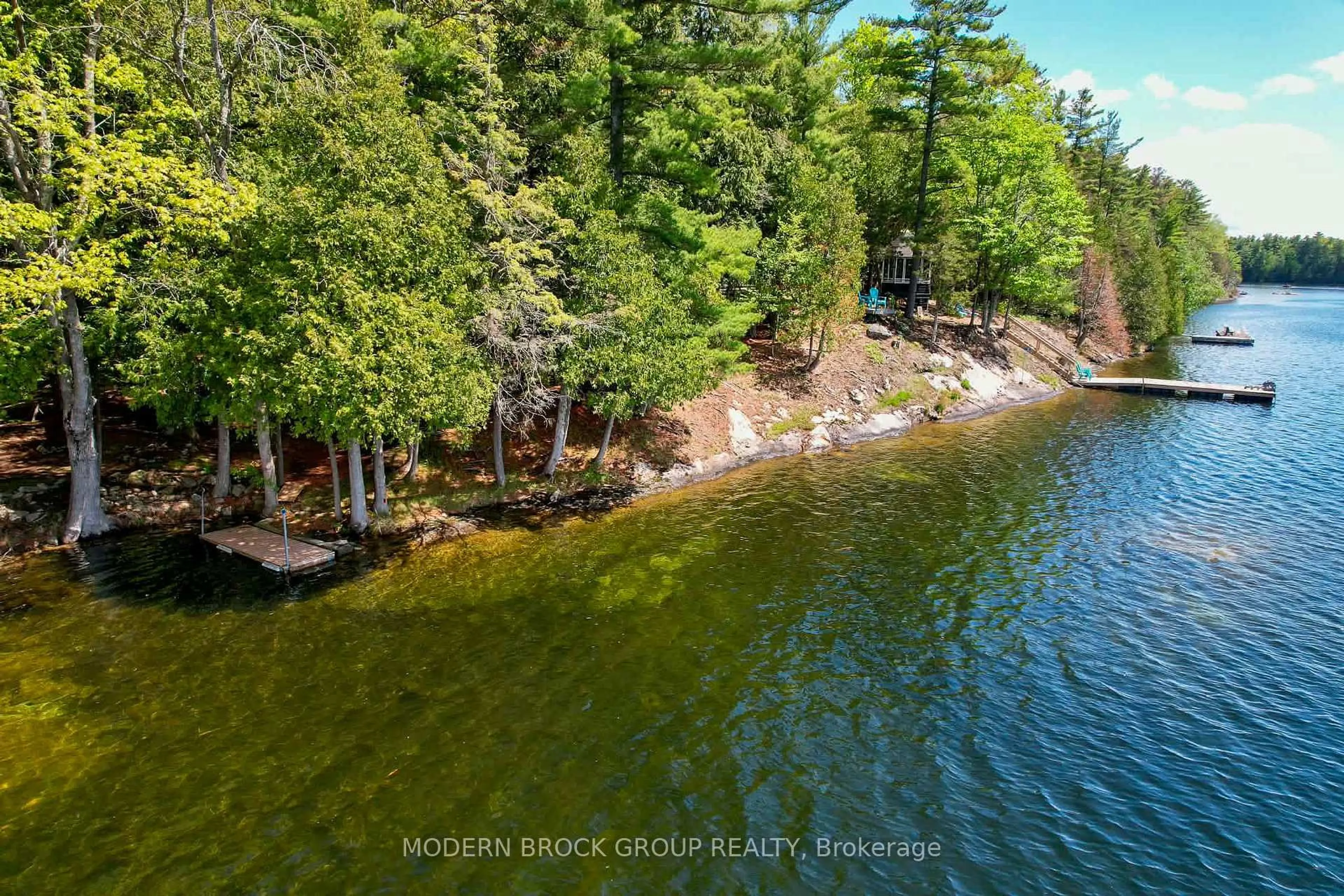 A pic from outside/outdoor area/front of a property/back of a property/a pic from drone, water/lake/river/ocean view for 32 Buck Island, Leeds and the Thousand Islands Ontario K0E 1B0