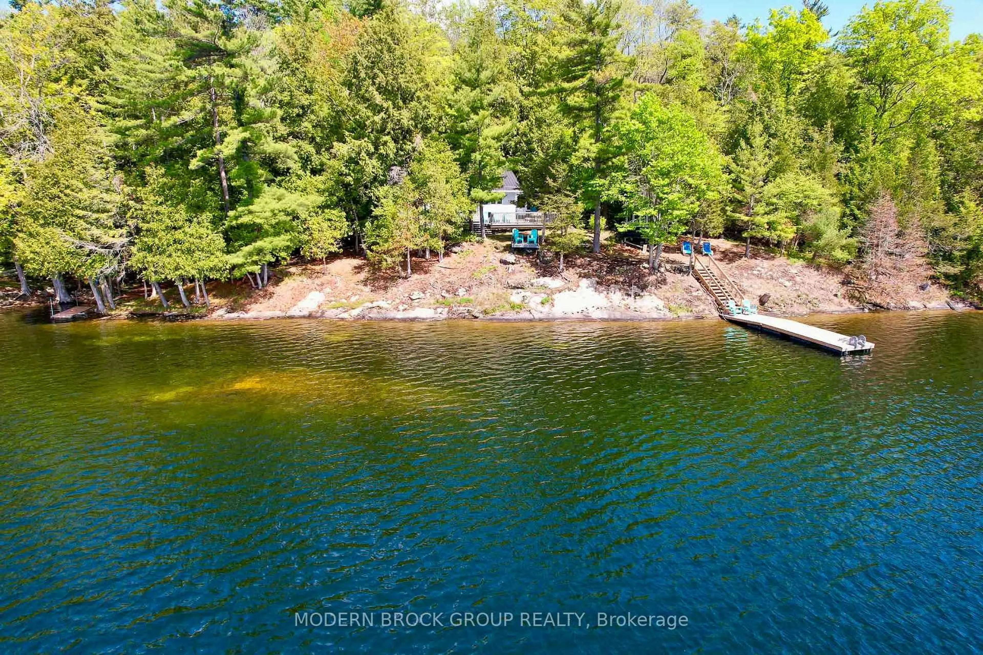 A pic from outside/outdoor area/front of a property/back of a property/a pic from drone, water/lake/river/ocean view for 32 Buck Island, Leeds and the Thousand Islands Ontario K0E 1B0
