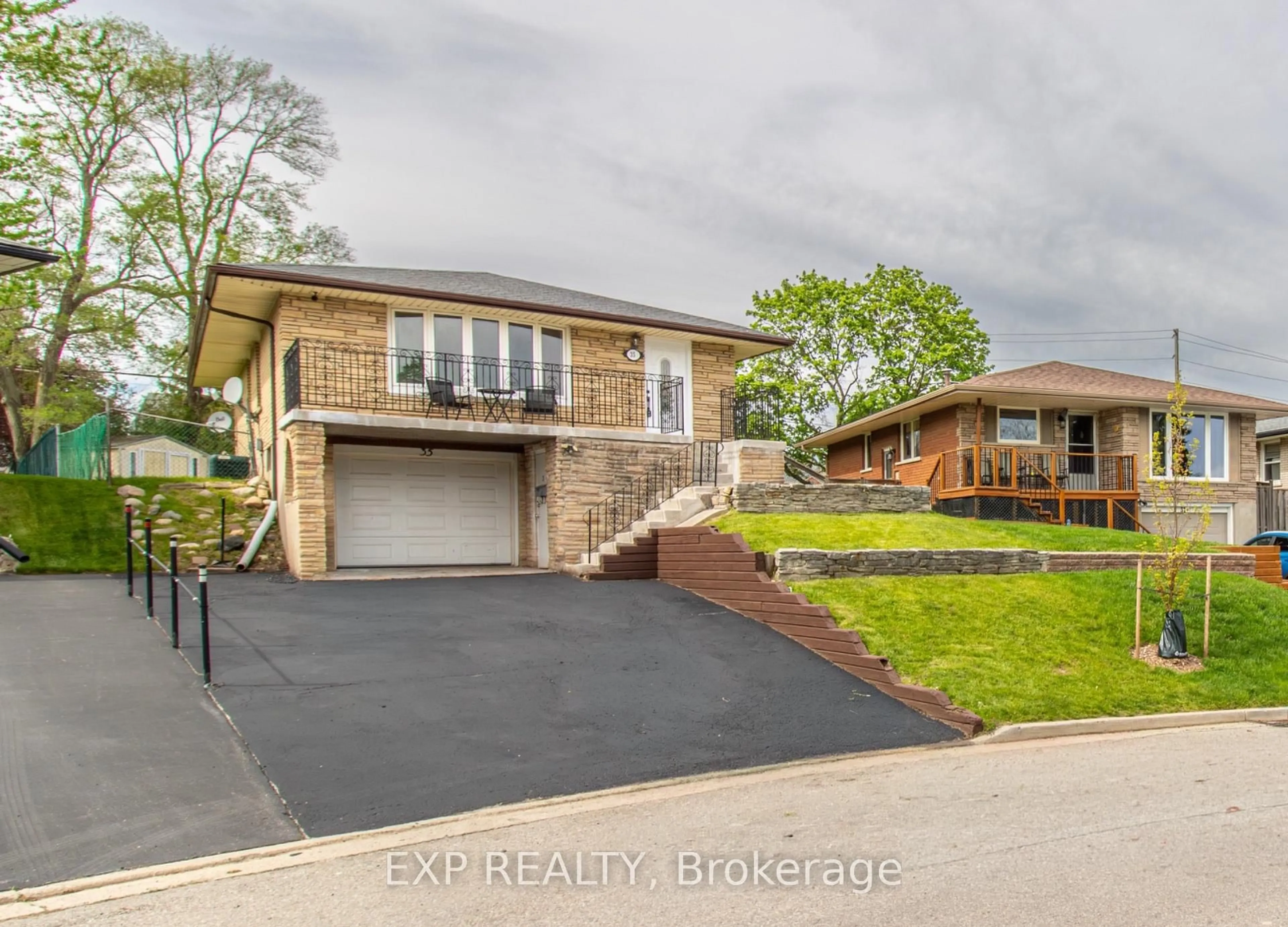 Home with brick exterior material, street for 35 Hillsborough Cres, Kitchener Ontario N2E 1J5