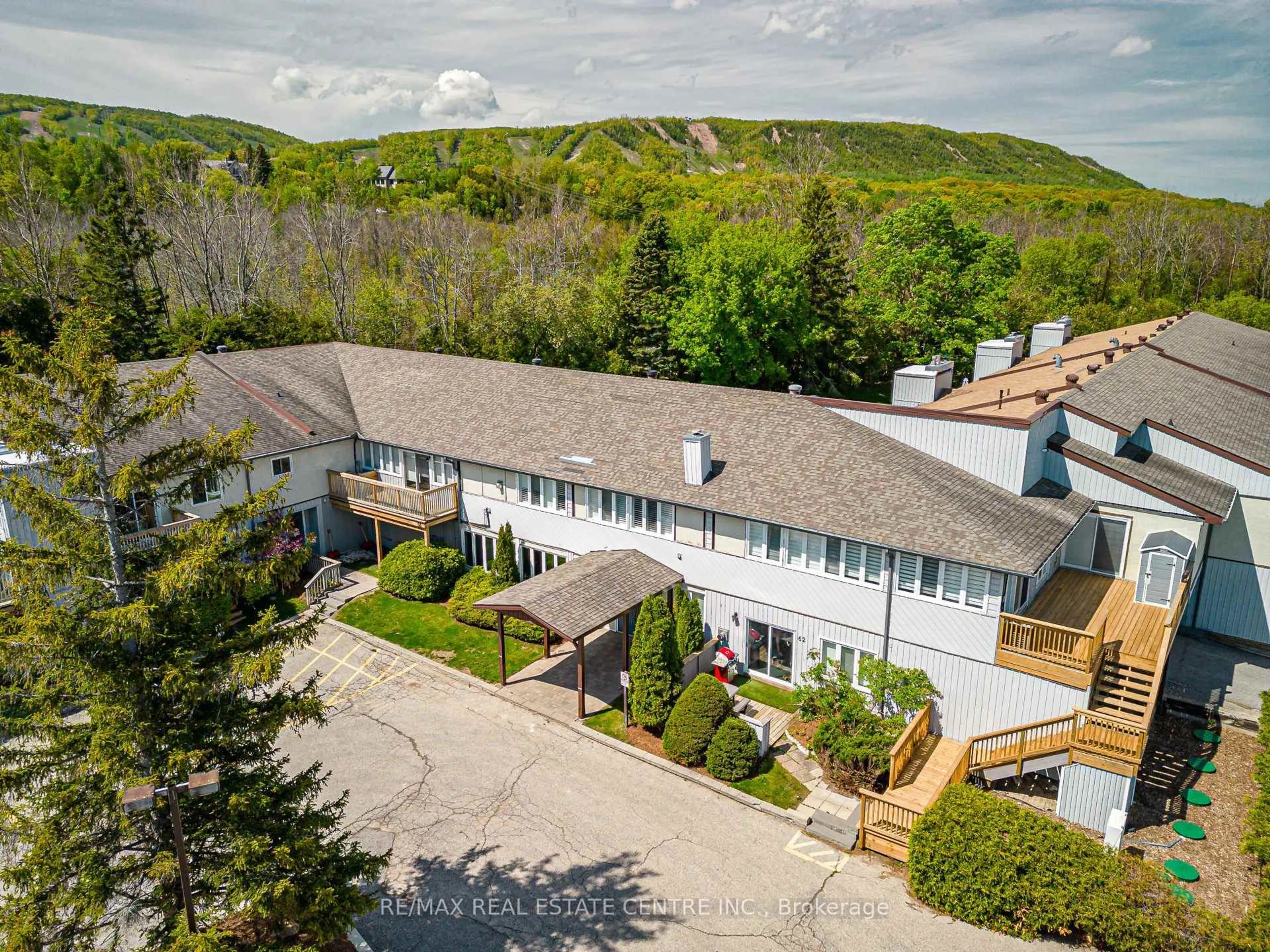 A pic from outside/outdoor area/front of a property/back of a property/a pic from drone, mountain view for 209472 Highway 26 #19, Blue Mountains Ontario L9Y 0V3