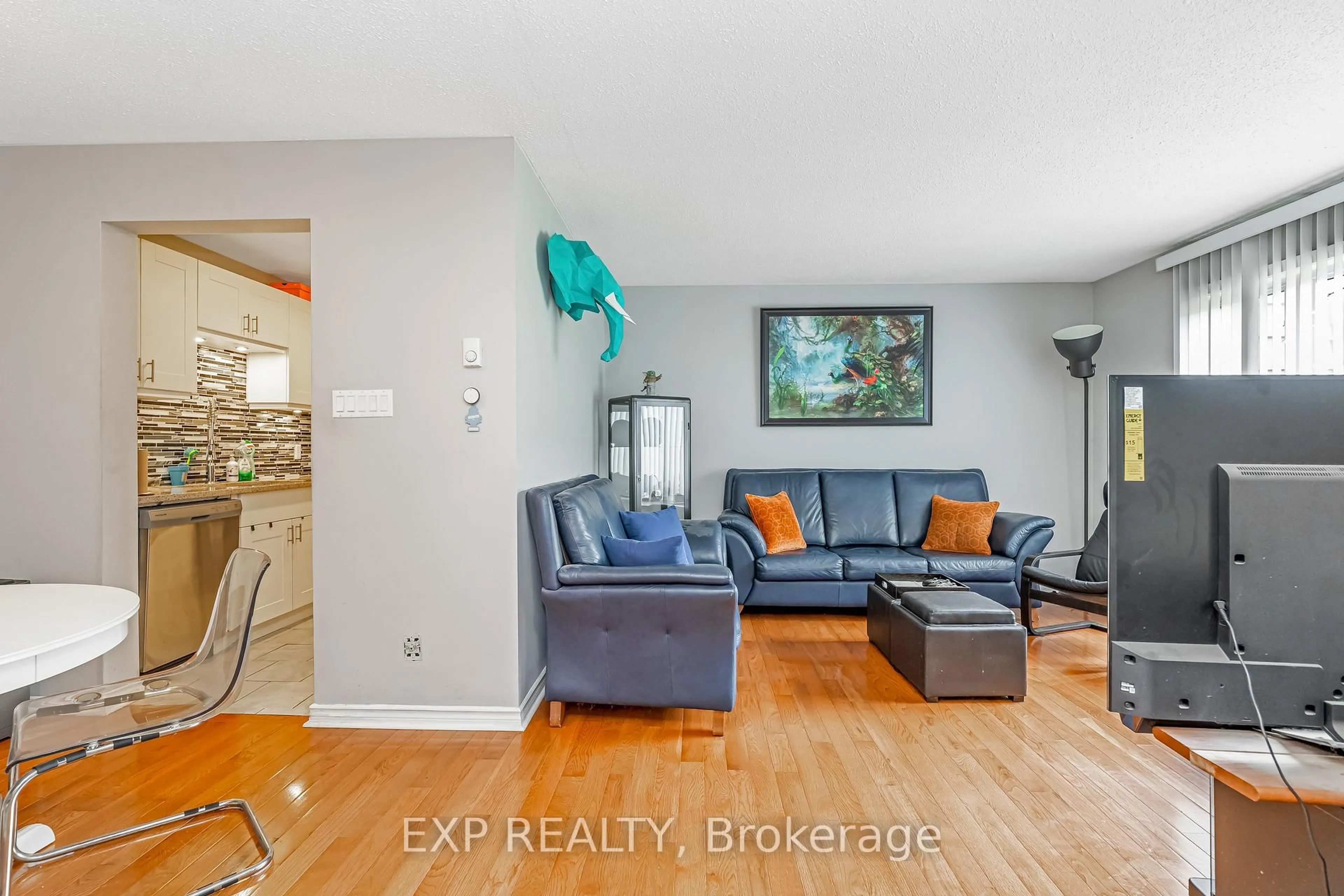 Living room with furniture, unknown for 2610 Draper Ave #12, Ottawa Ontario K2H 8X8