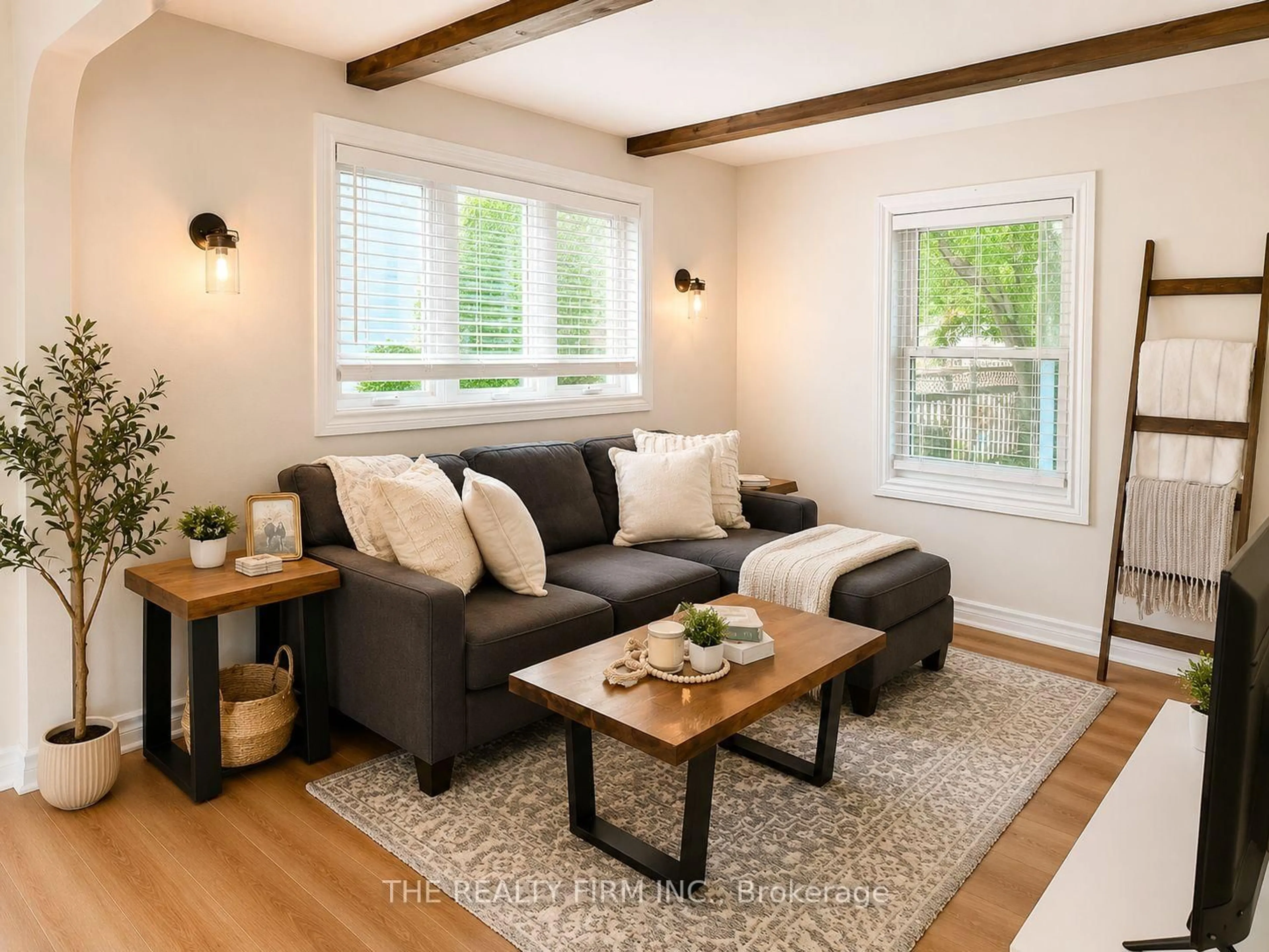 Living room with furniture, wood/laminate floor for 105 Pine Lawn Ave, London East Ontario N5Z 2R1