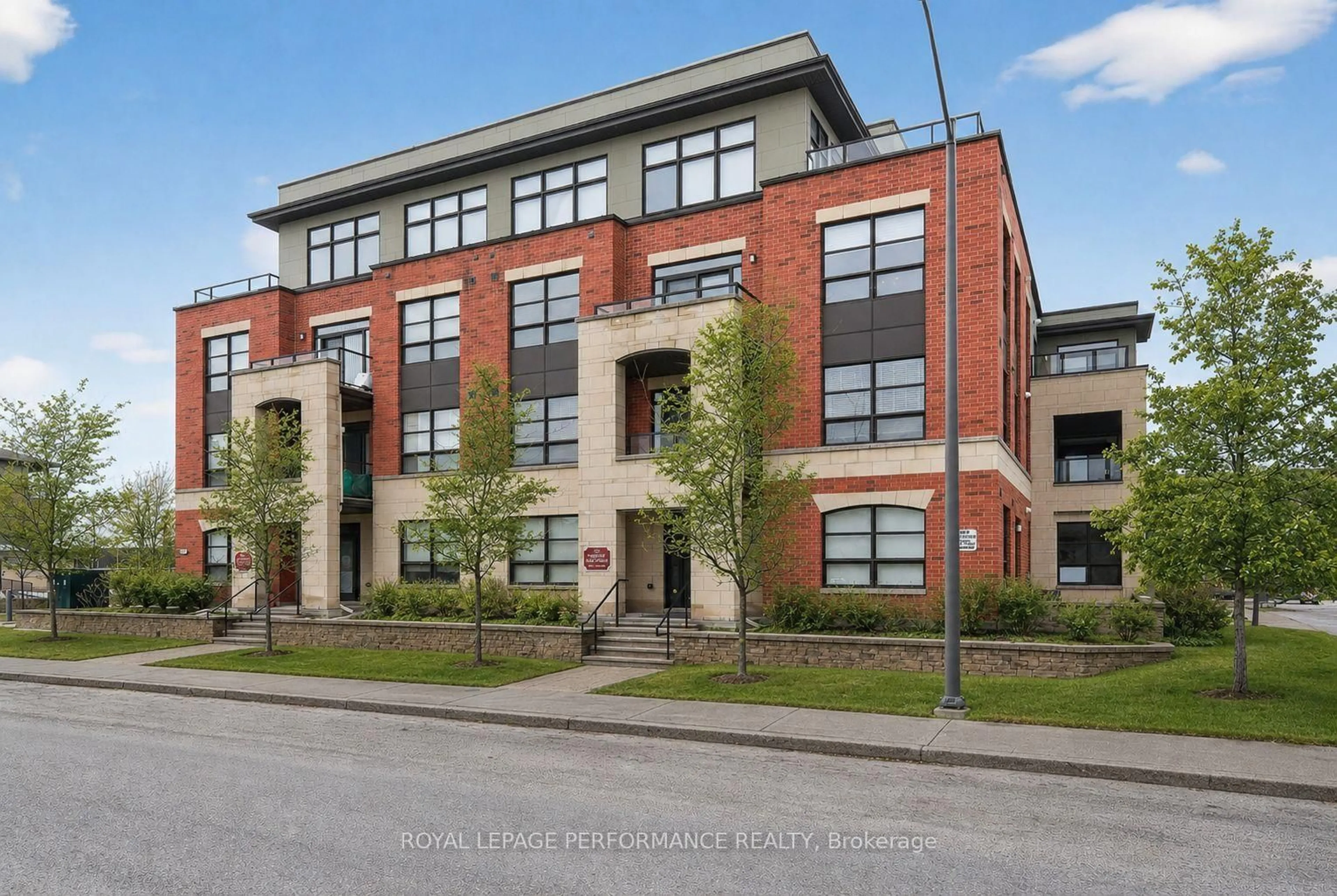 Home with brick exterior material, street for 669 Sue Holloway Dr #305, Ottawa Ontario K2J 5W4