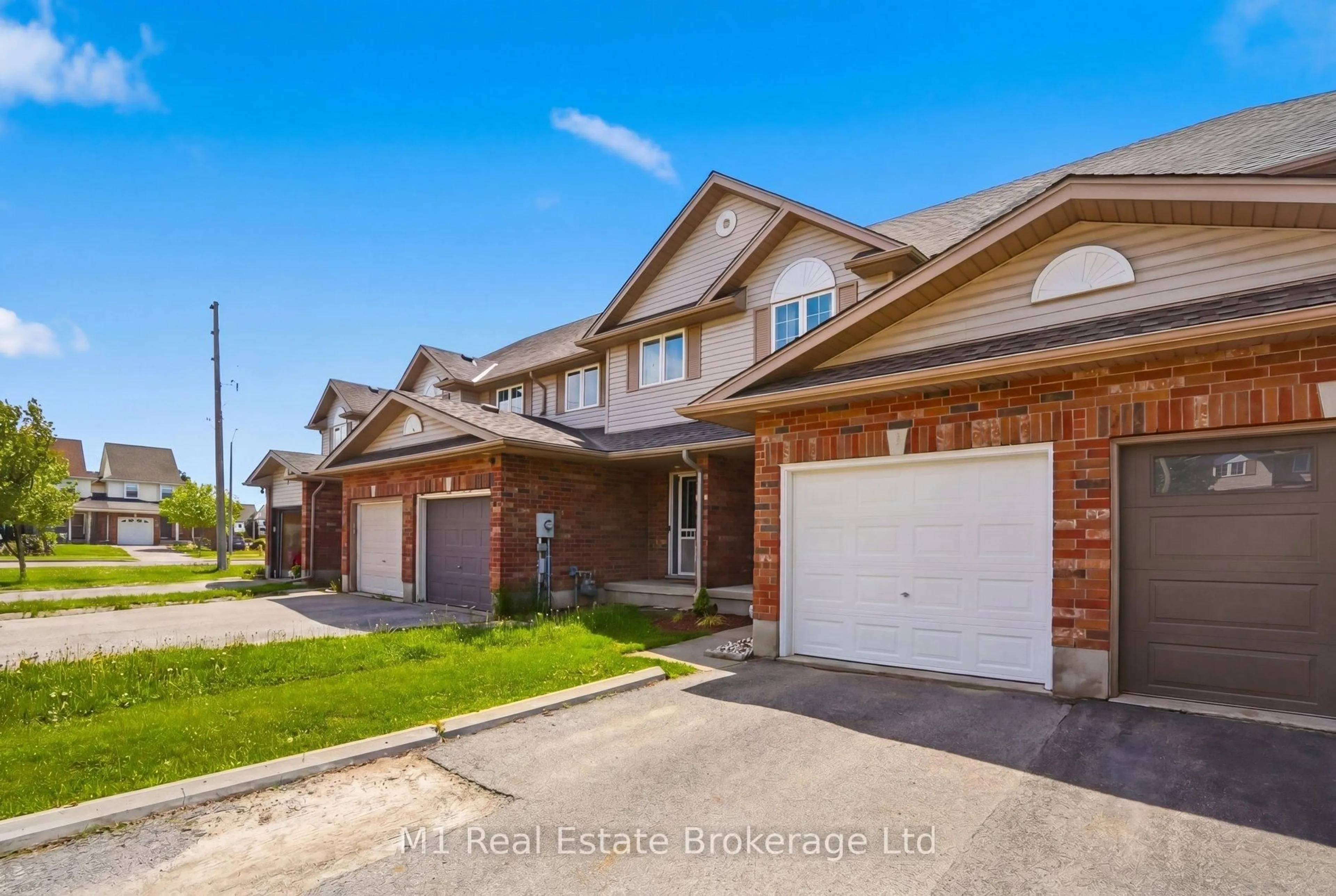 Home with brick exterior material, street for 8 Ralston Dr, Guelph Ontario N1E 0C3