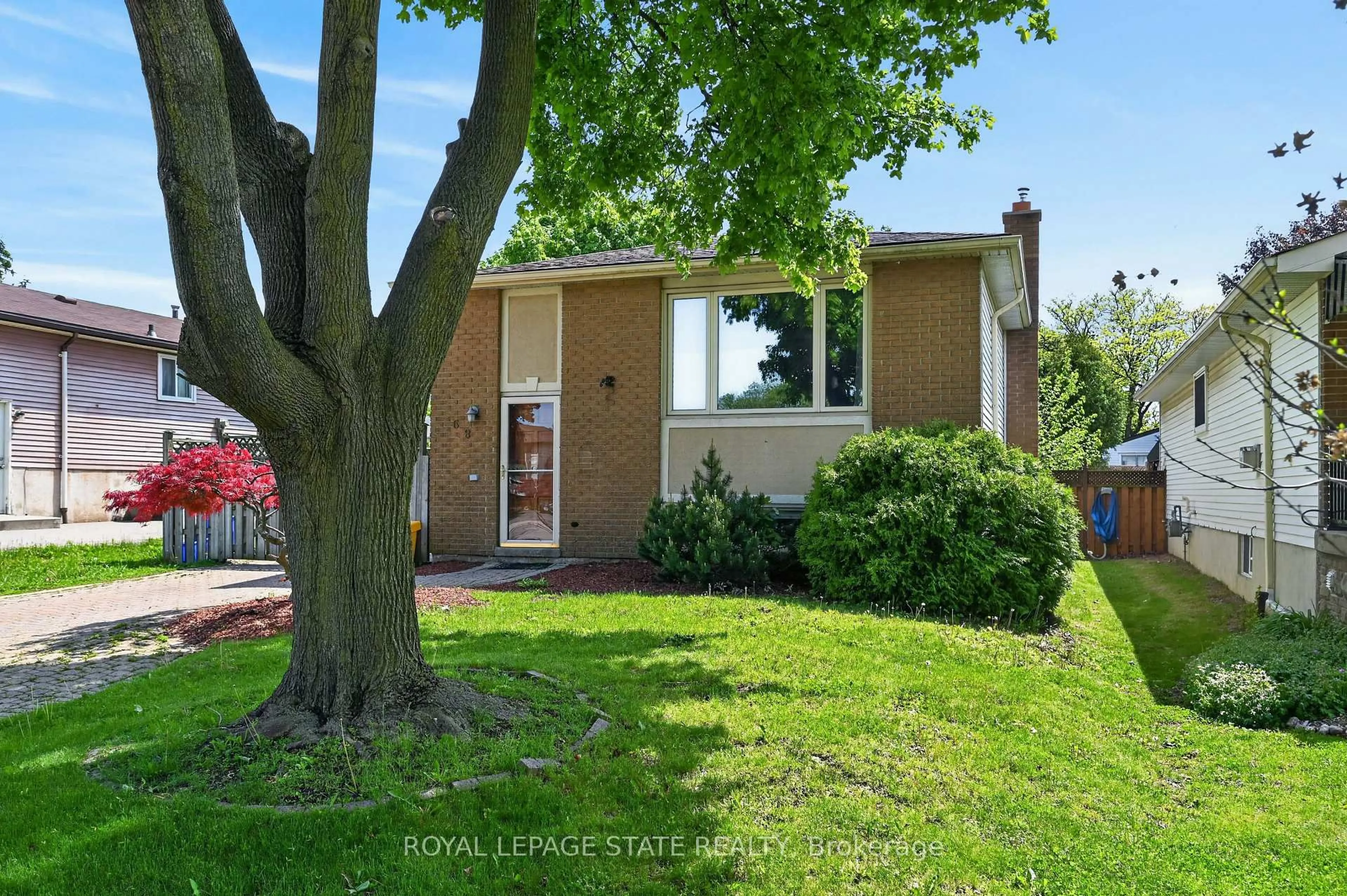 Home with brick exterior material, street for 68 Duncairn Cres, Hamilton Ontario L9C 6G1
