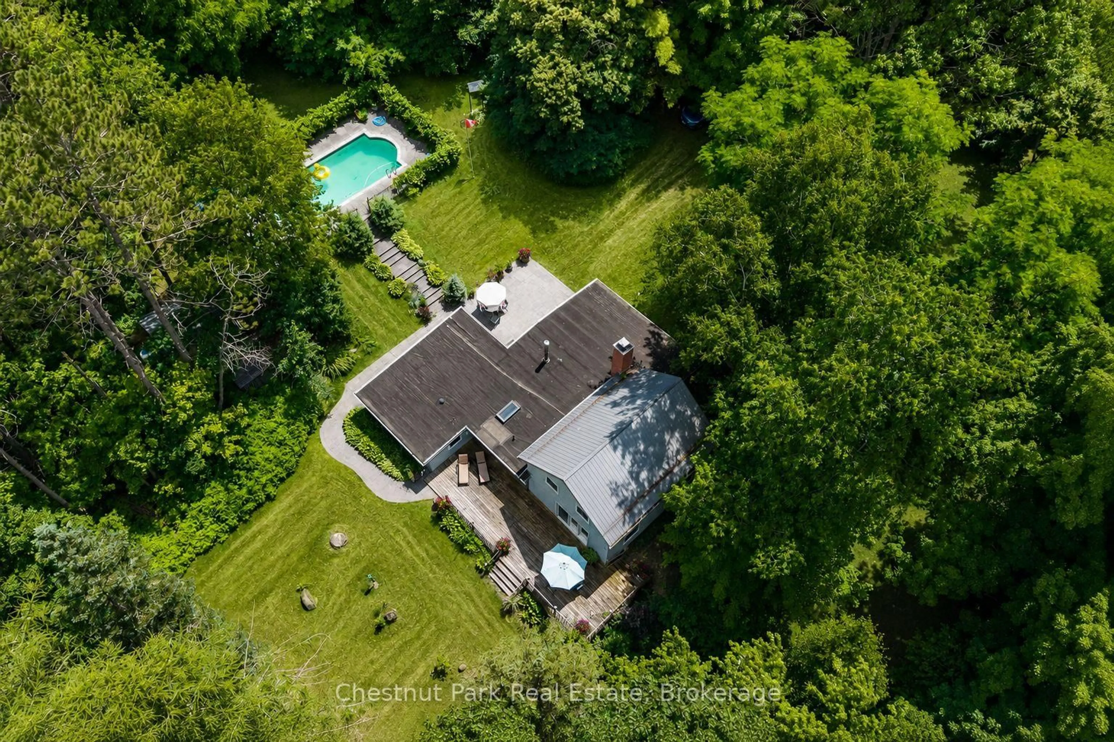 A pic from outside/outdoor area/front of a property/back of a property/a pic from drone, unknown for 838151 4th Line, Mulmur Ontario L9V 0J6