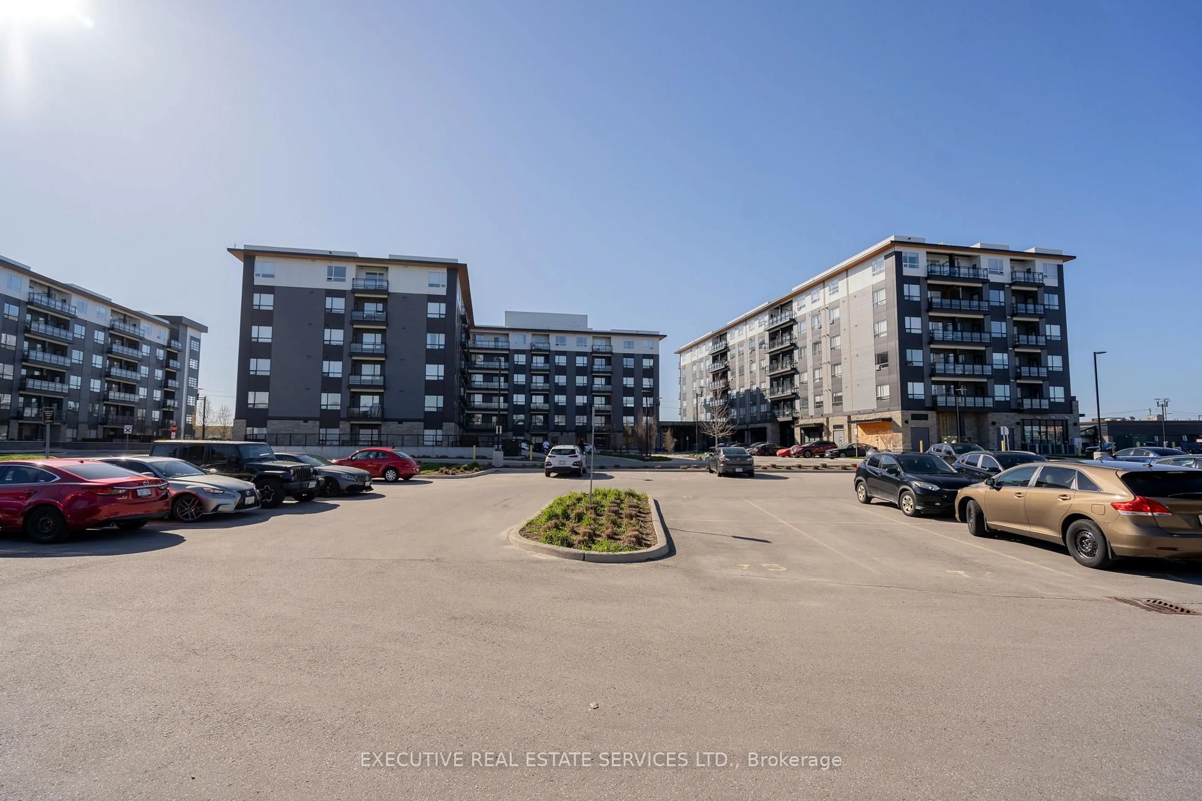 A pic from outside/outdoor area/front of a property/back of a property/a pic from drone, unknown for 251 Northfield Dr #322, Waterloo Ontario N2K 0G9