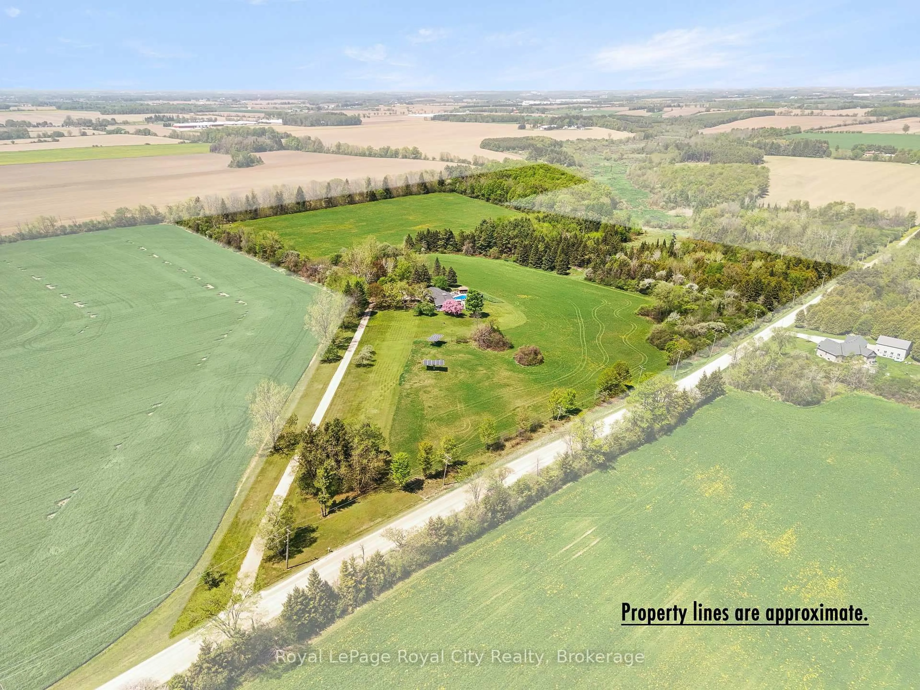 A pic from outside/outdoor area/front of a property/back of a property/a pic from drone, water/lake/river/ocean view for 5902 Sideroad 6, Centre Wellington Ontario N1H 6J2