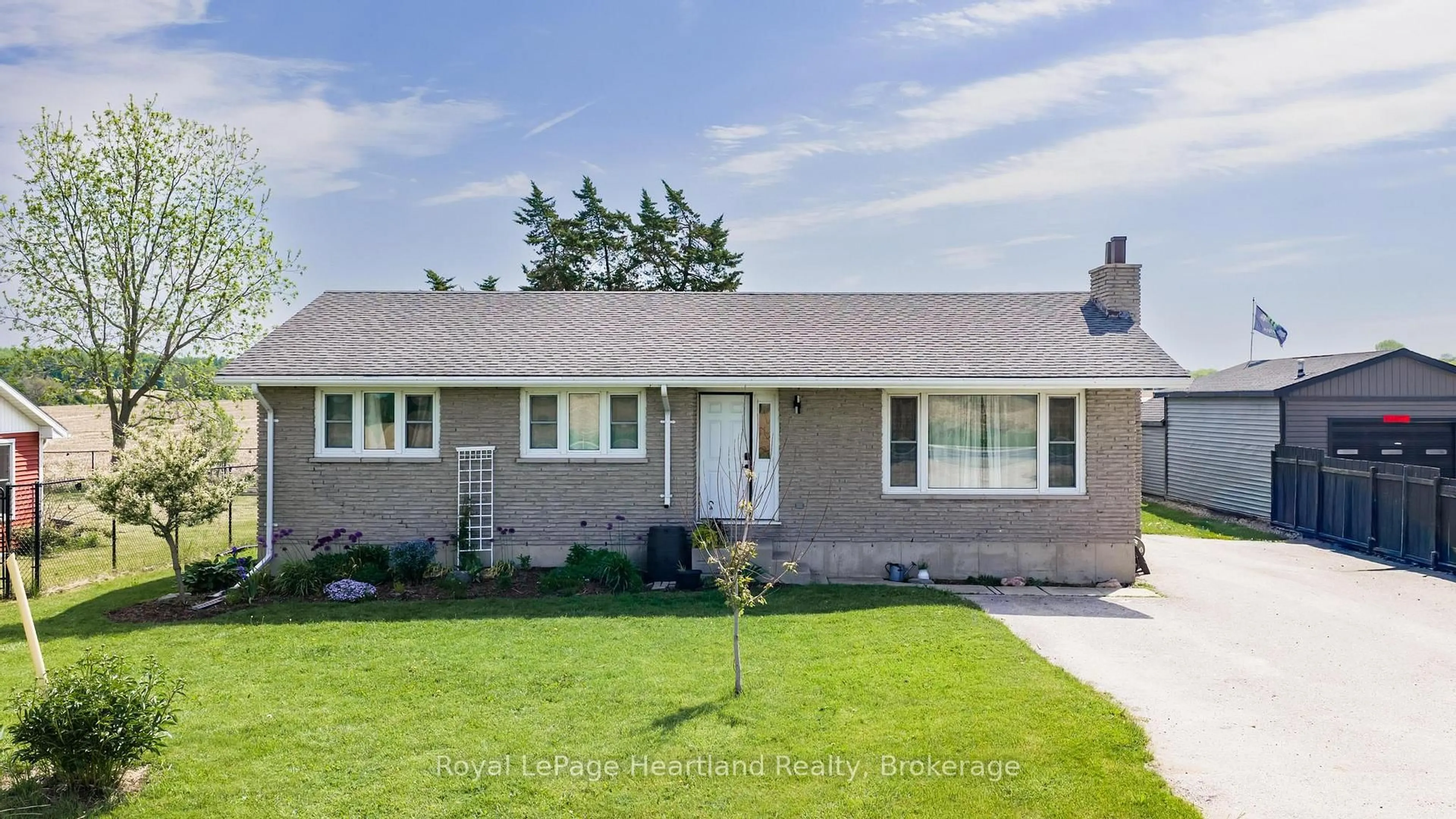 Home with brick exterior material, street for 77292 London Rd, Huron East Ontario N0M 1L0