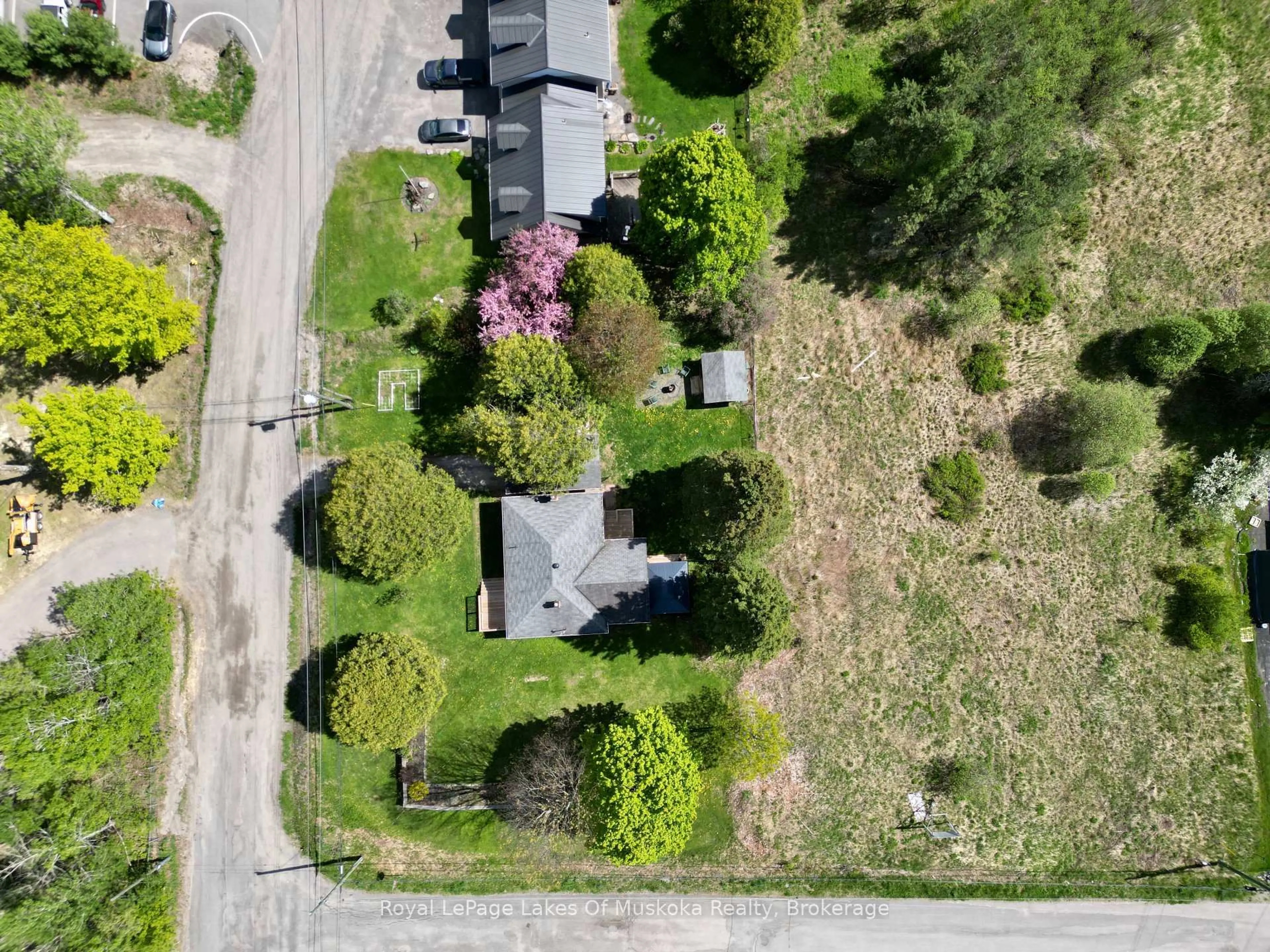 A pic from outside/outdoor area/front of a property/back of a property/a pic from drone, street for 30 Kitchen Rd, Huntsville Ontario P1H 1Y3