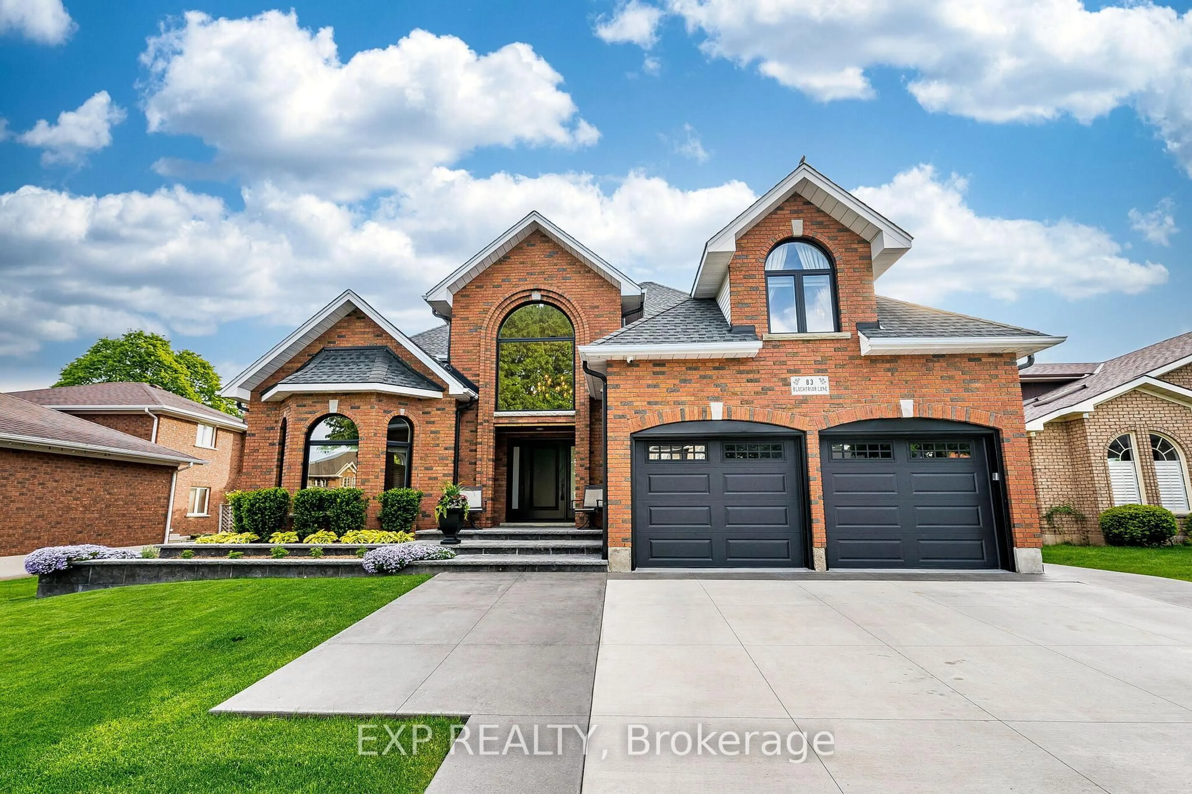 Home with brick exterior material, street for 83 Blackfriar Lane, Brantford Ontario N3R 7M2