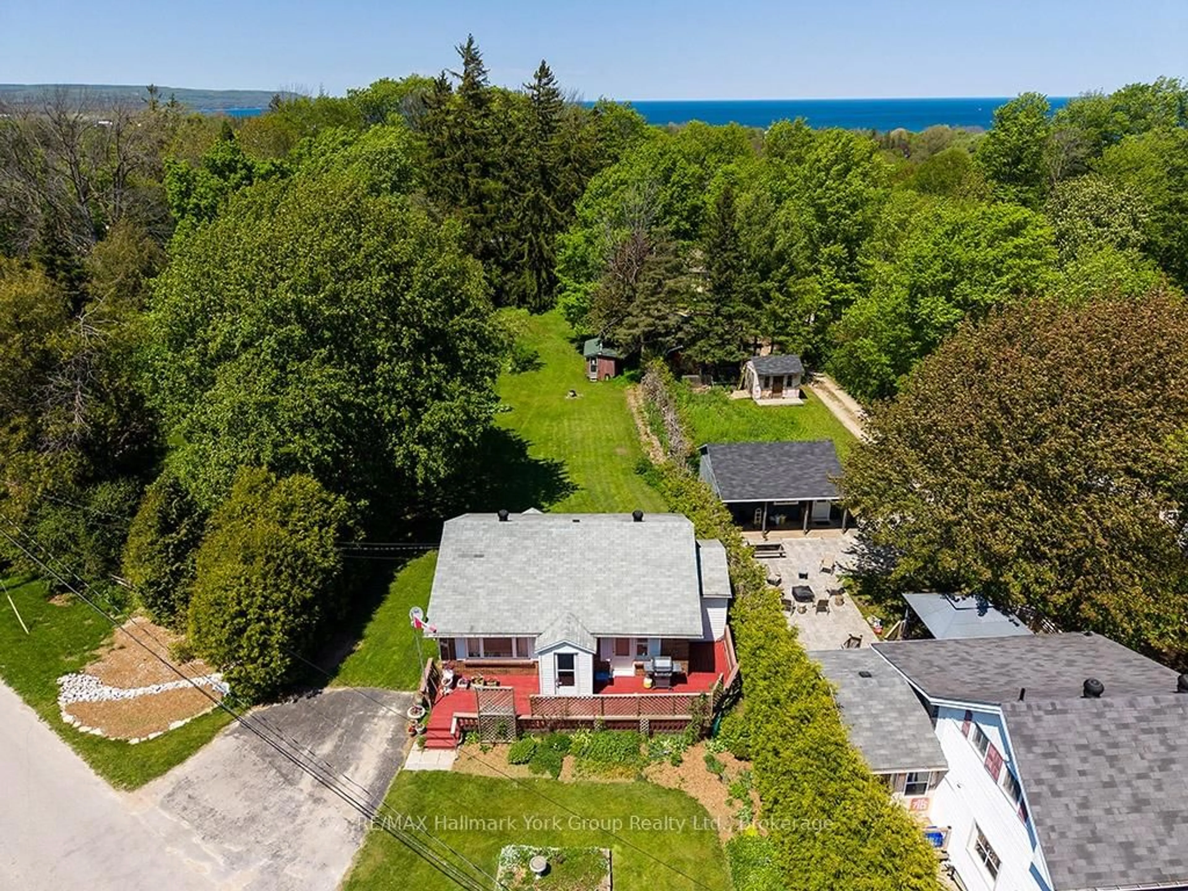 A pic from outside/outdoor area/front of a property/back of a property/a pic from drone, water/lake/river/ocean view for 88 Gray Ave, Meaford Ontario N4L 1C4