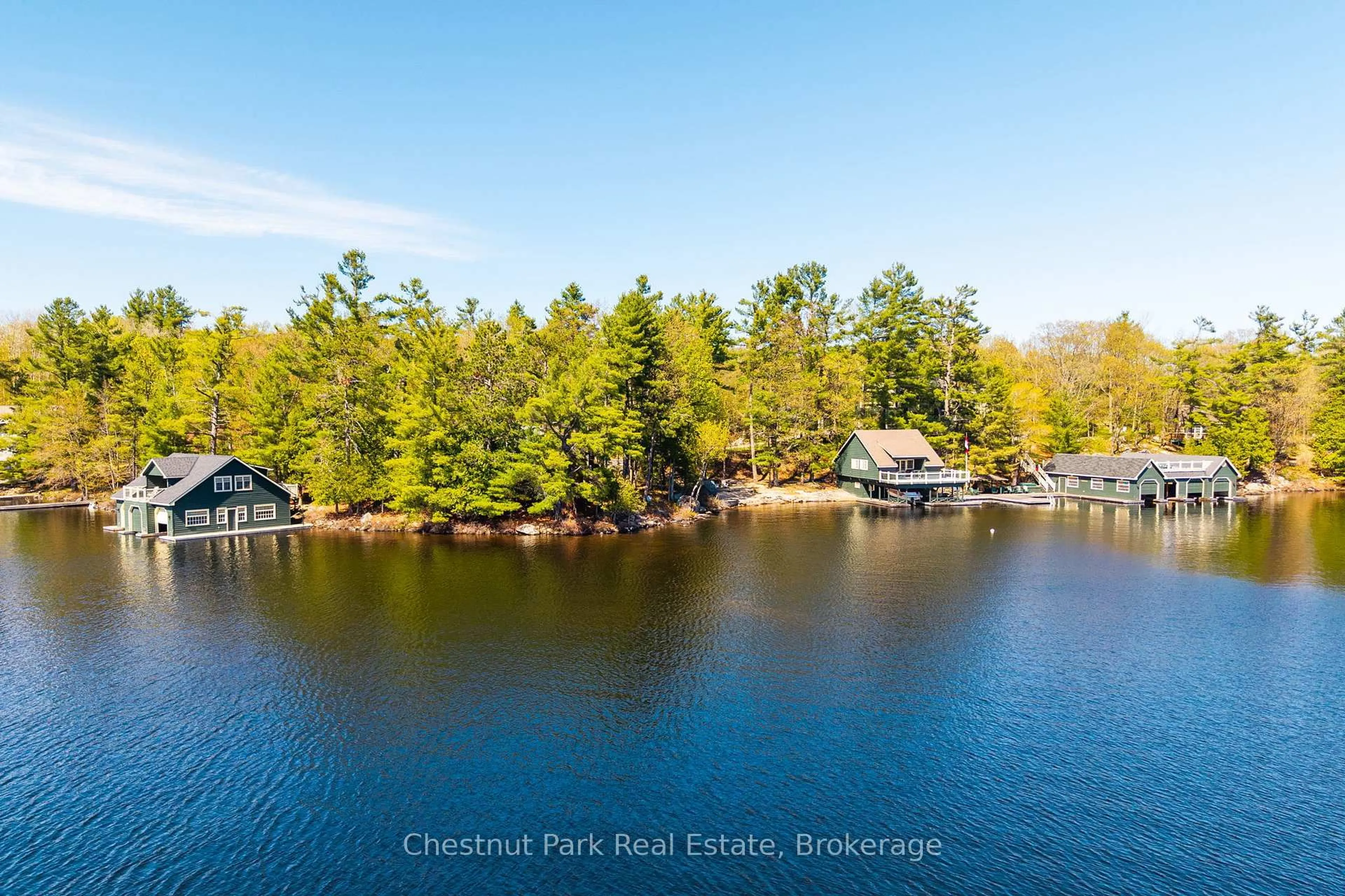 A pic from outside/outdoor area/front of a property/back of a property/a pic from drone, water/lake/river/ocean view for 1064 Heather Lodge Rd #1 & 3, Muskoka Lakes Ontario P0B 1J0