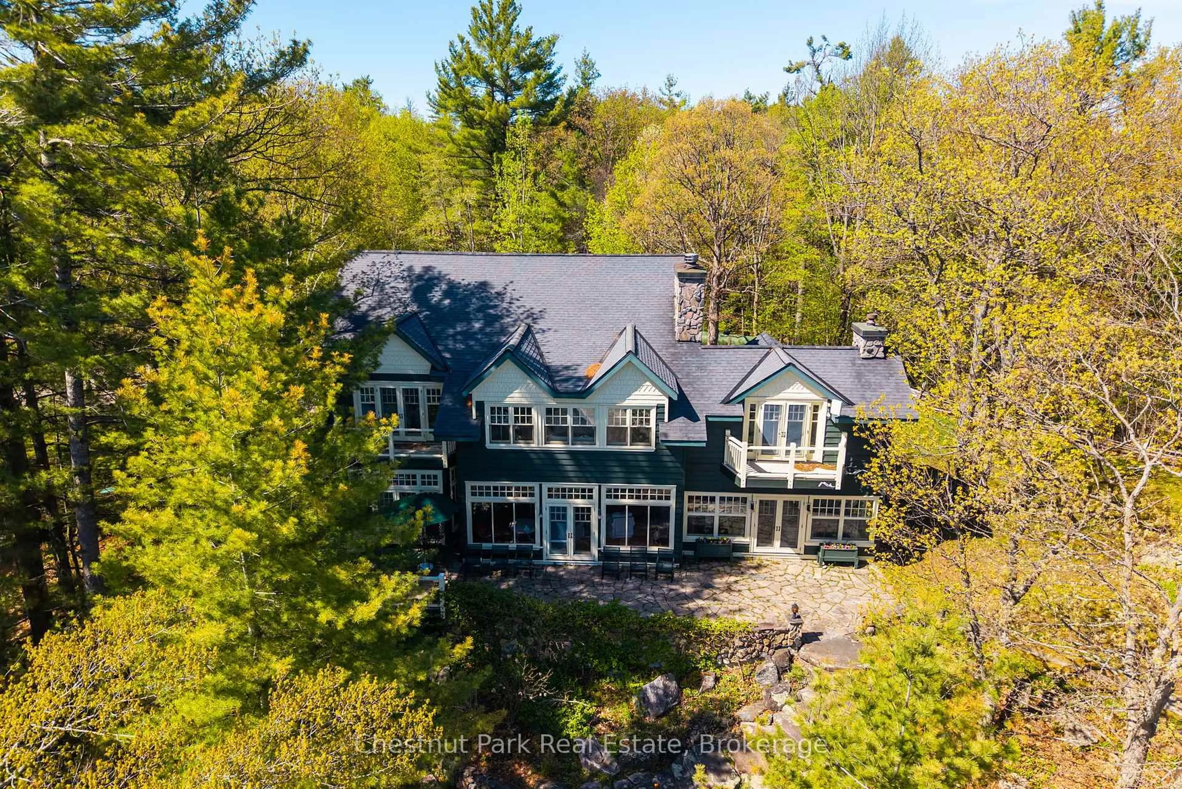 A pic from outside/outdoor area/front of a property/back of a property/a pic from drone, water/lake/river/ocean view for 1064 Heather Lodge Rd #1 & 3, Muskoka Lakes Ontario P0B 1J0