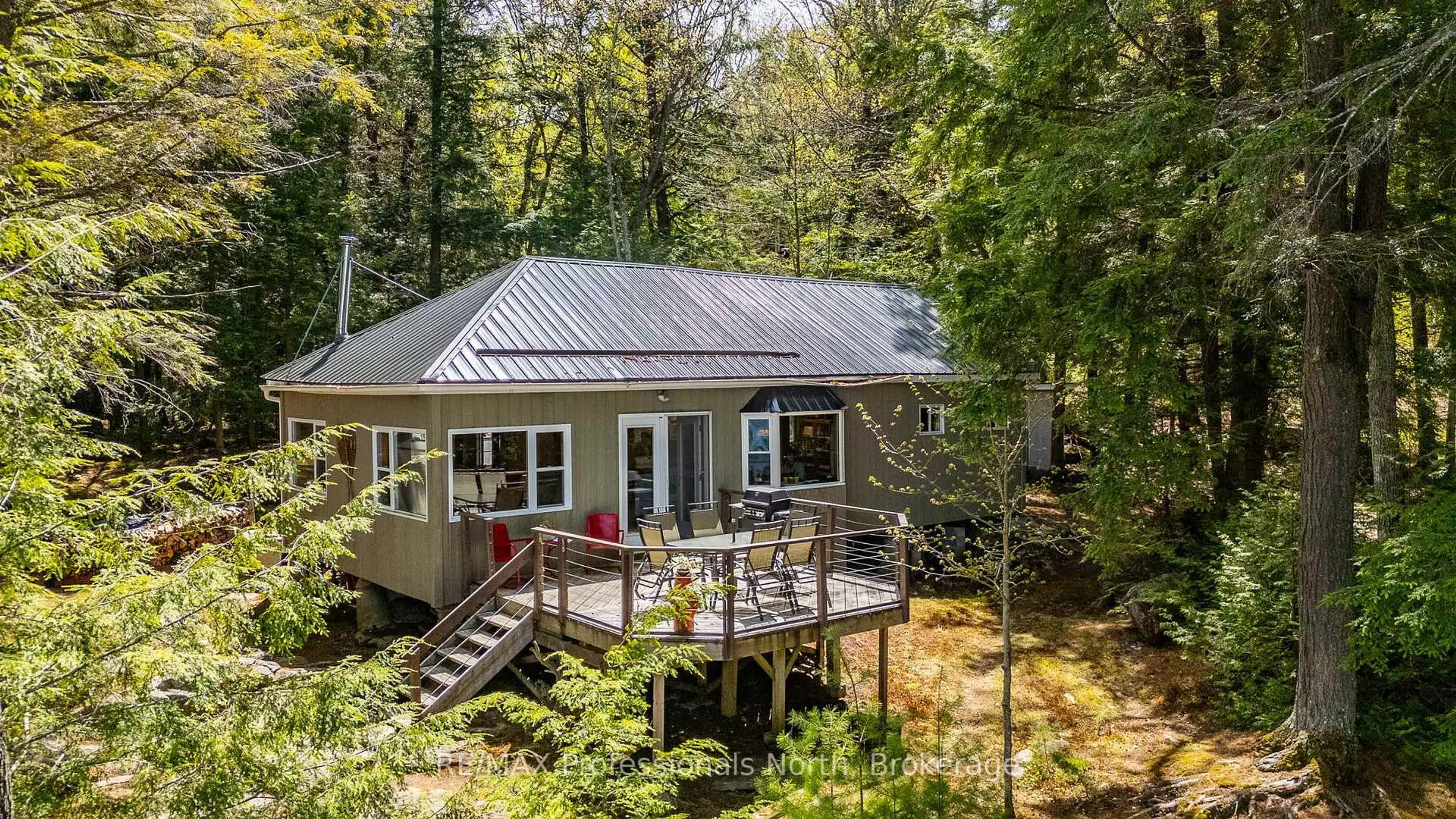 Home with vinyl exterior material, forest/trees view for 54261 BIG HAWK EAST SHORE, Algonquin Highlands Ontario K0M 1J1