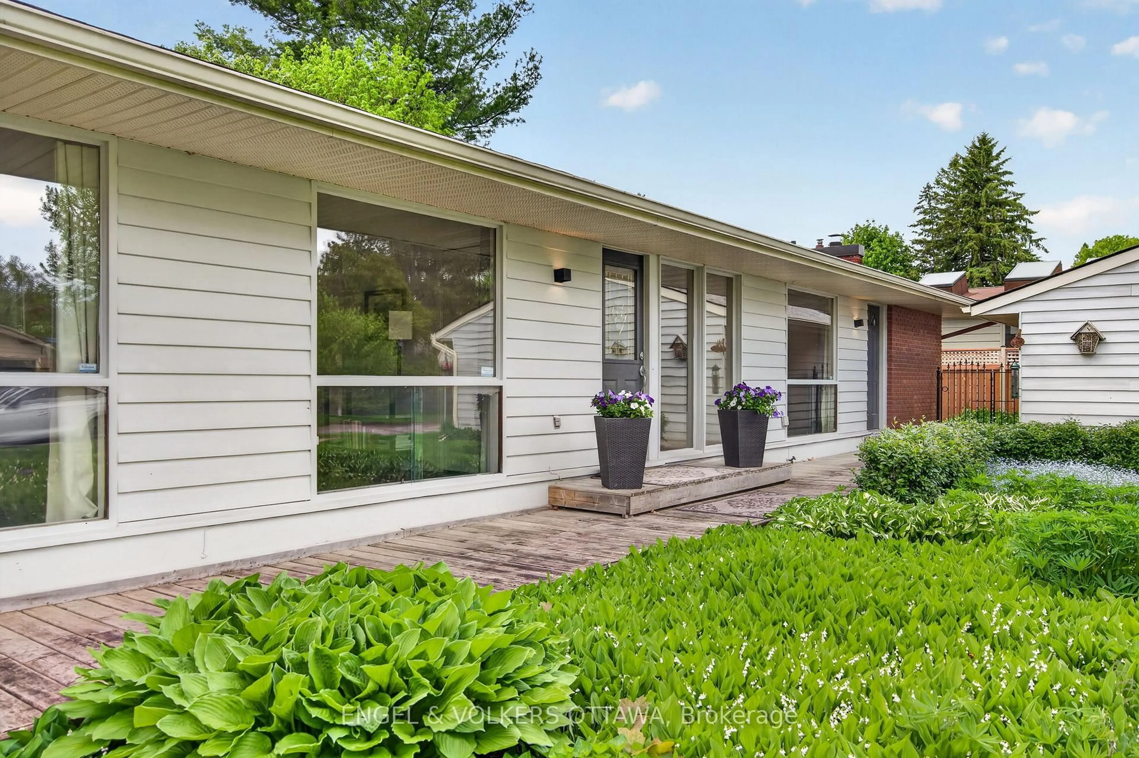 Home with vinyl exterior material, street for 35 Riopelle Crt, Kanata Ontario K2K 1J2