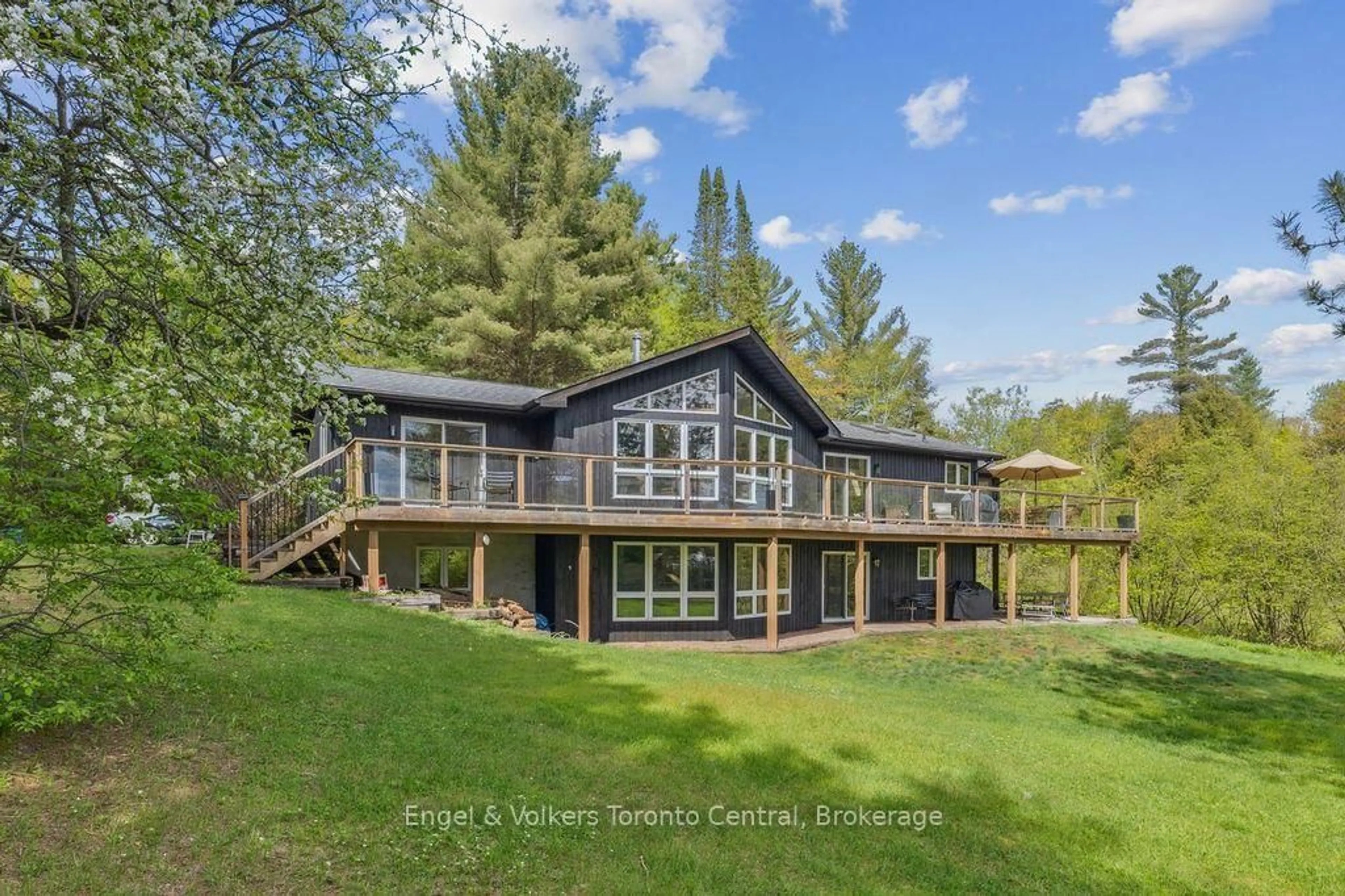 A pic from outside/outdoor area/front of a property/back of a property/a pic from drone, water/lake/river/ocean view for 1823 Livingstone Lake Rd, Algonquin Highlands Ontario P0A 1E0
