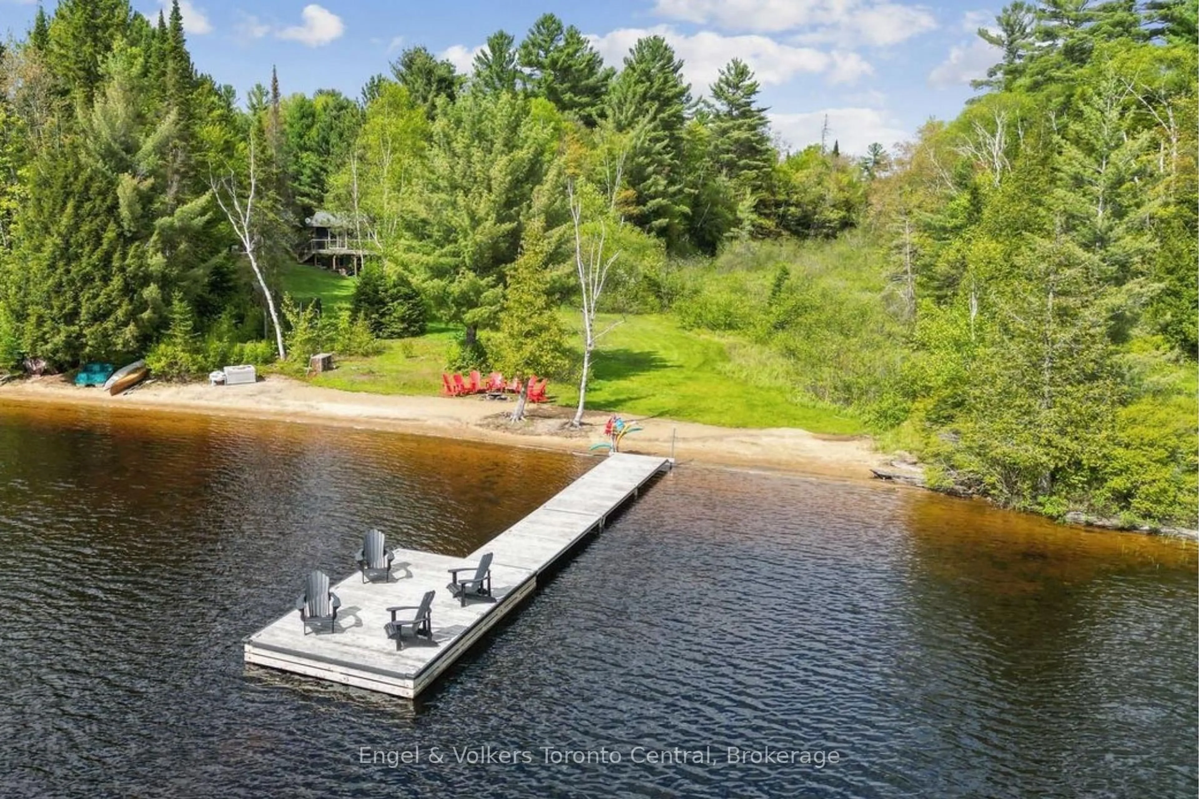 A pic from outside/outdoor area/front of a property/back of a property/a pic from drone, water/lake/river/ocean view for 1823 Livingstone Lake Rd, Algonquin Highlands Ontario P0A 1E0