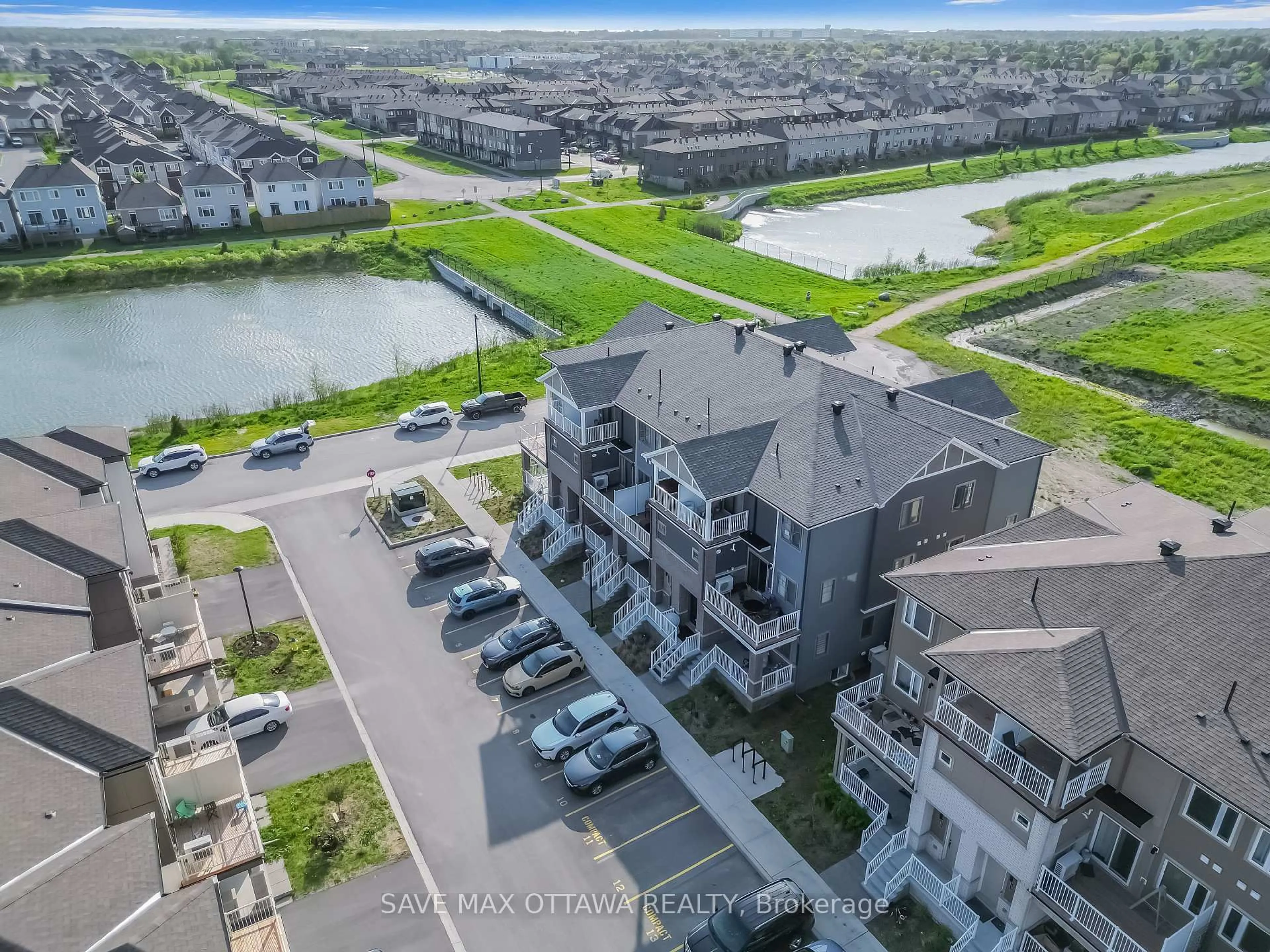A pic from outside/outdoor area/front of a property/back of a property/a pic from drone, water/lake/river/ocean view for 703 Chromite Pv Private #2, Ottawa Ontario K2J 7J2