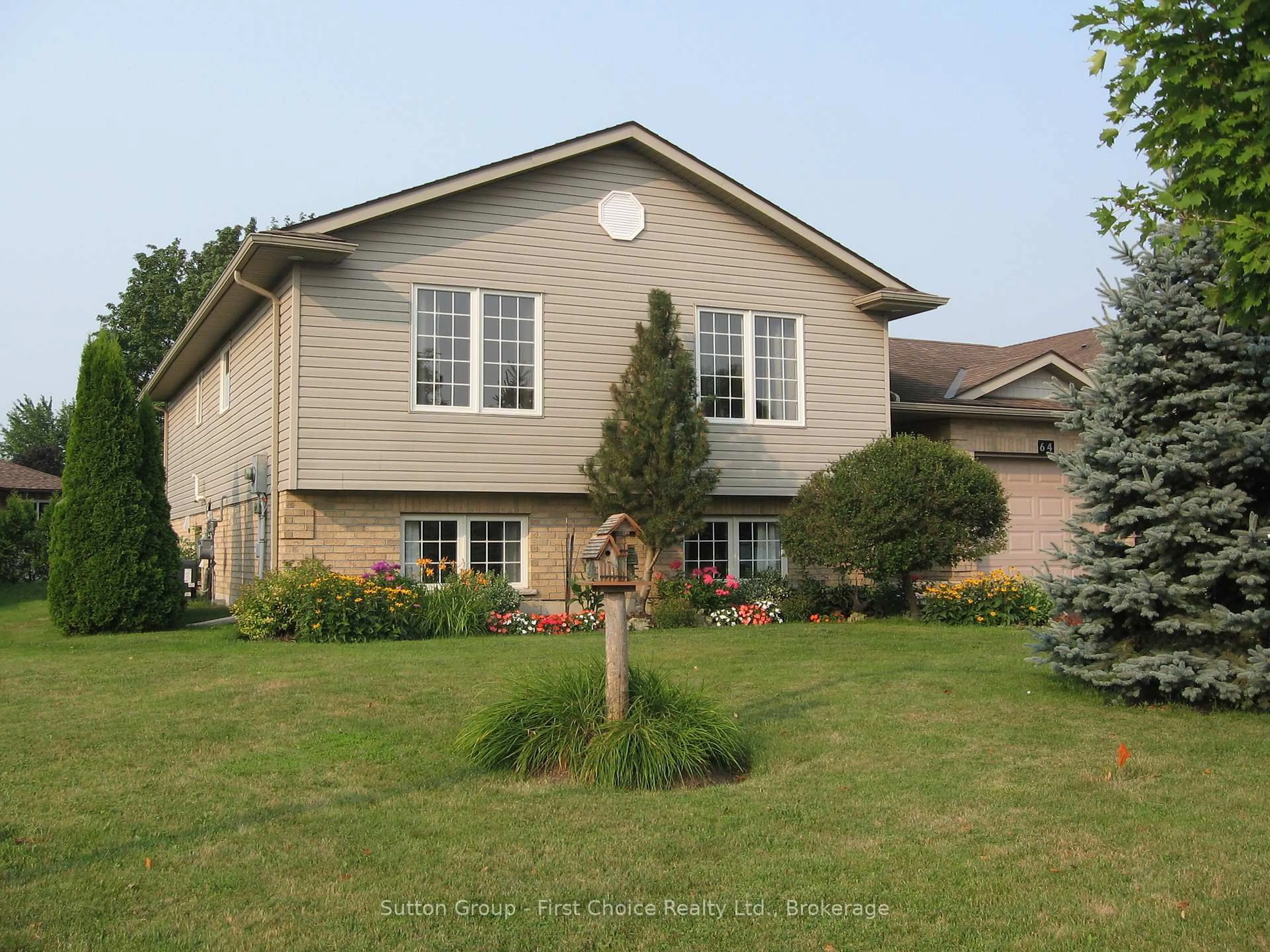 Home with vinyl exterior material, street for 64 Park Lane, West Perth Ontario N0K 1N0