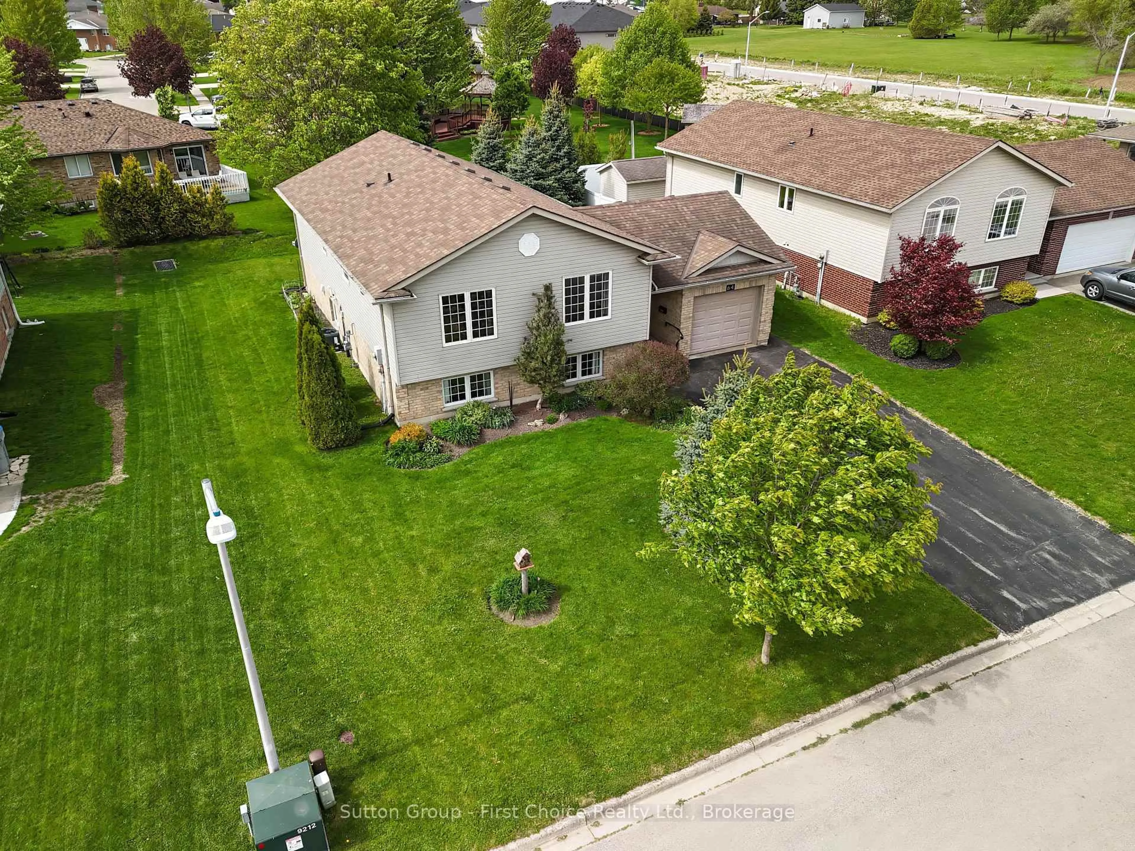 A pic from outside/outdoor area/front of a property/back of a property/a pic from drone, street for 64 Park Lane, West Perth Ontario N0K 1N0