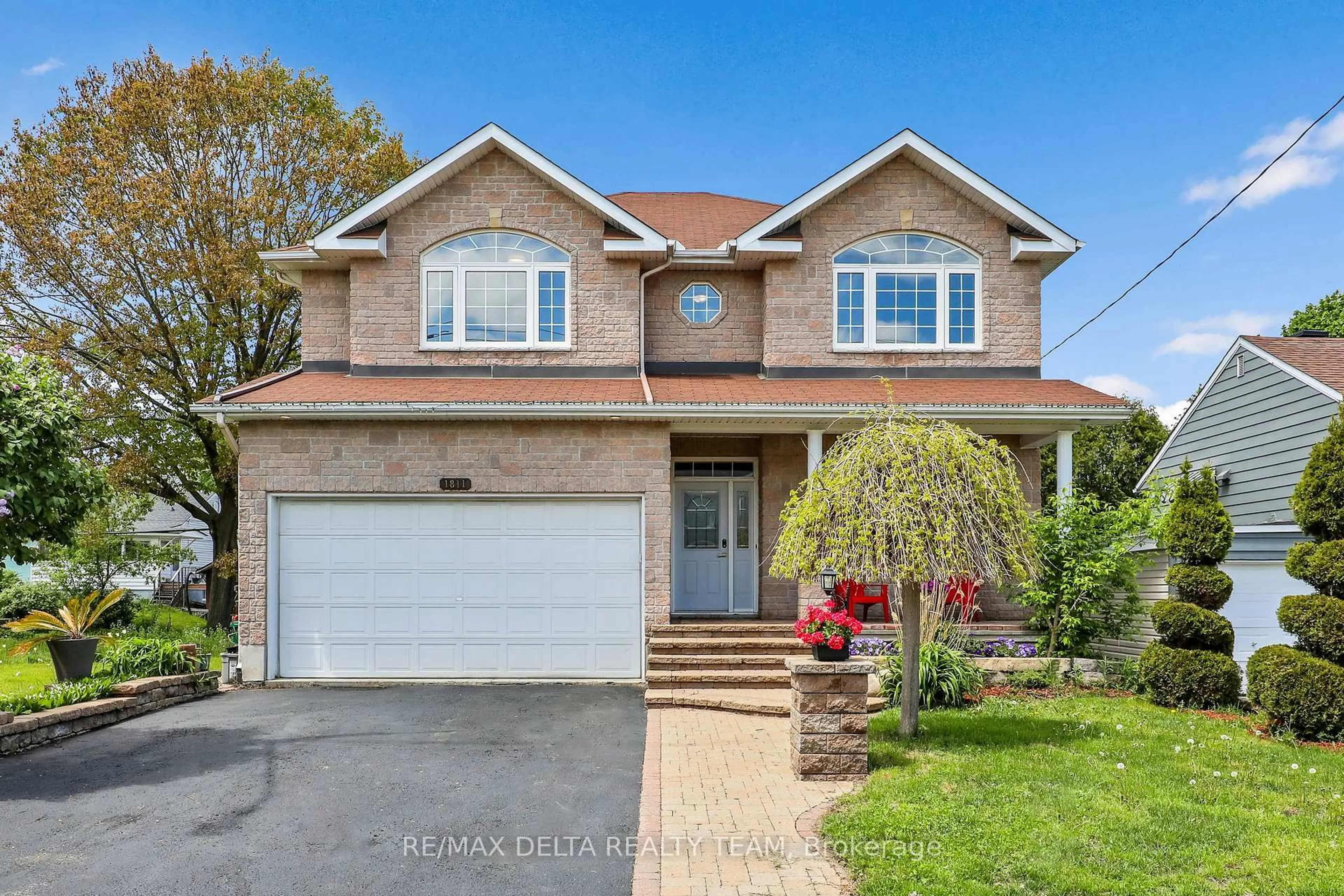 Home with brick exterior material, street for 1811 Kingsdale Ave, Ottawa Ontario K1T 1H7