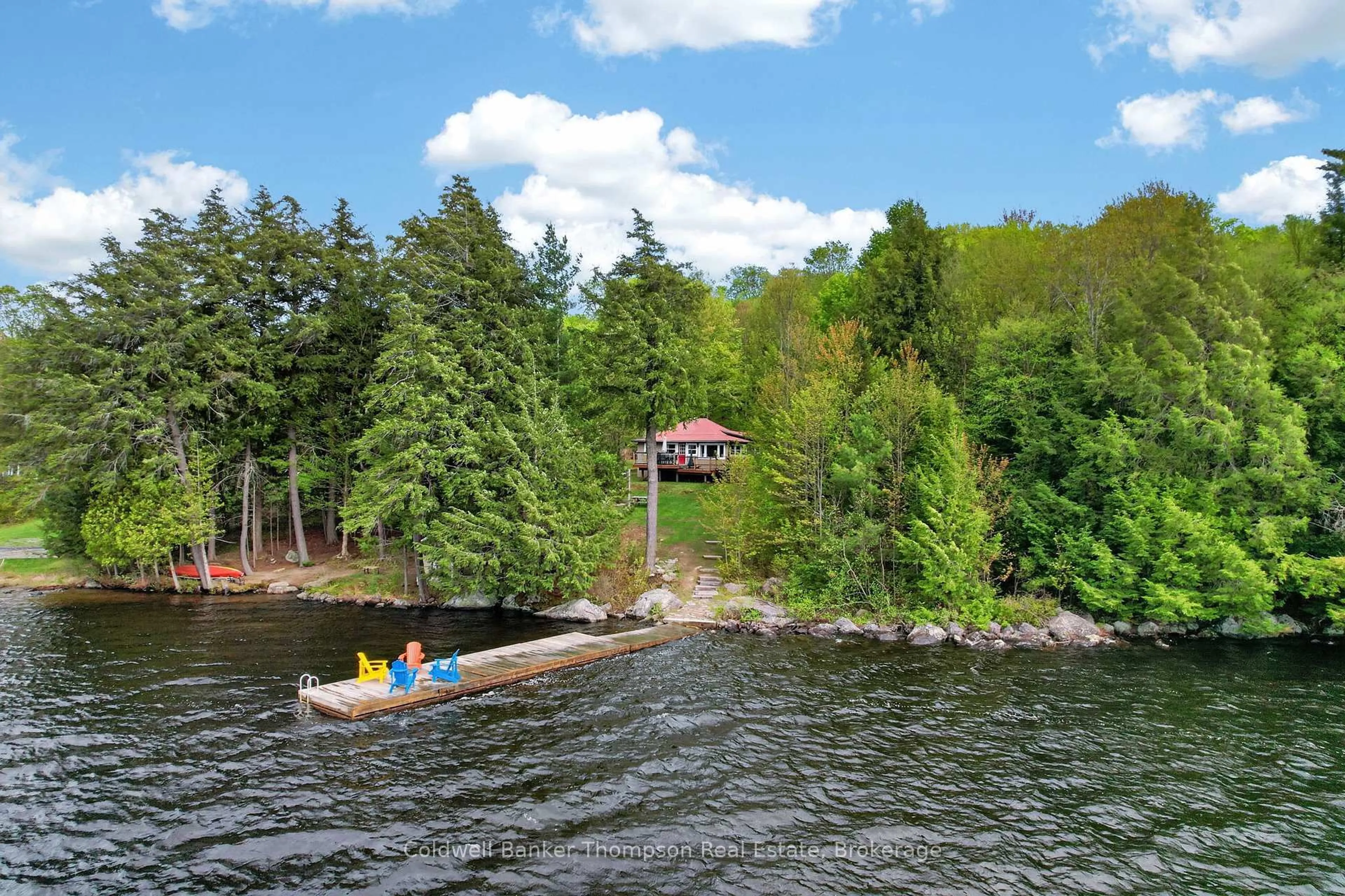 A pic from outside/outdoor area/front of a property/back of a property/a pic from drone, water/lake/river/ocean view for 112 Bittern Lake Lane, Perry Ontario P0A 1R0