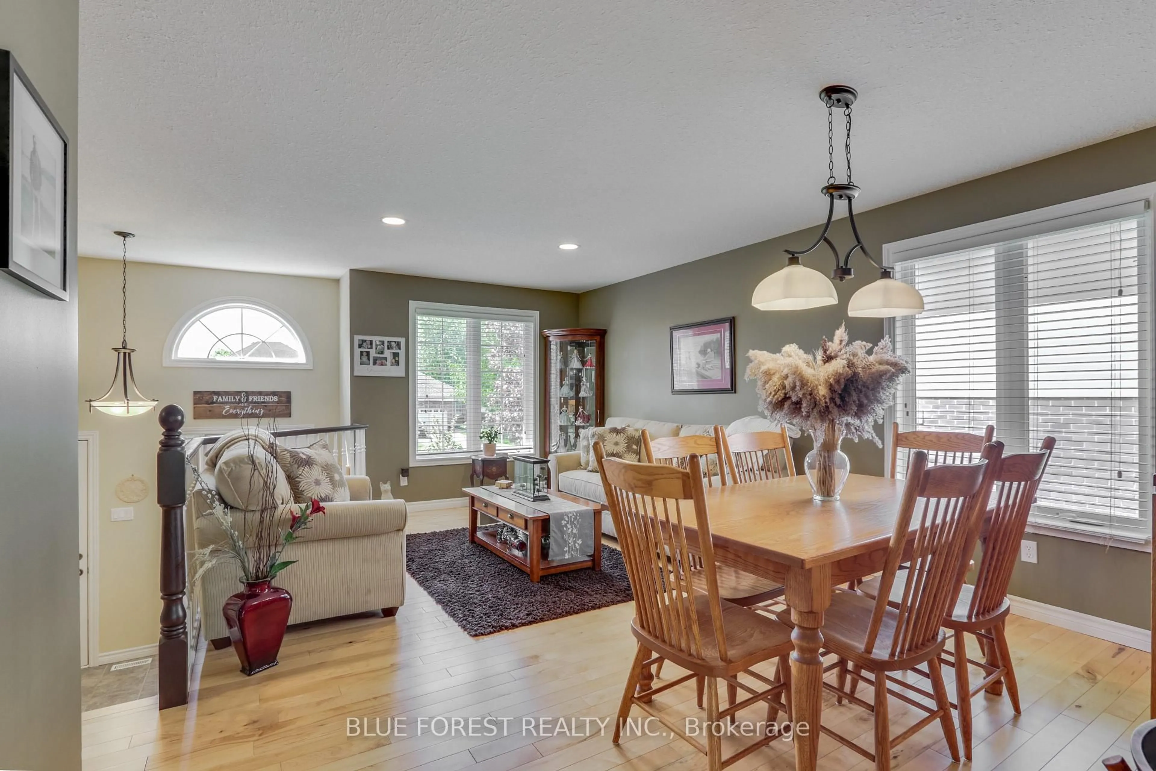 Open concept kitchen, wood/laminate floor for 116 Woodvale Dr, Thames Centre Ontario N0L 1G3