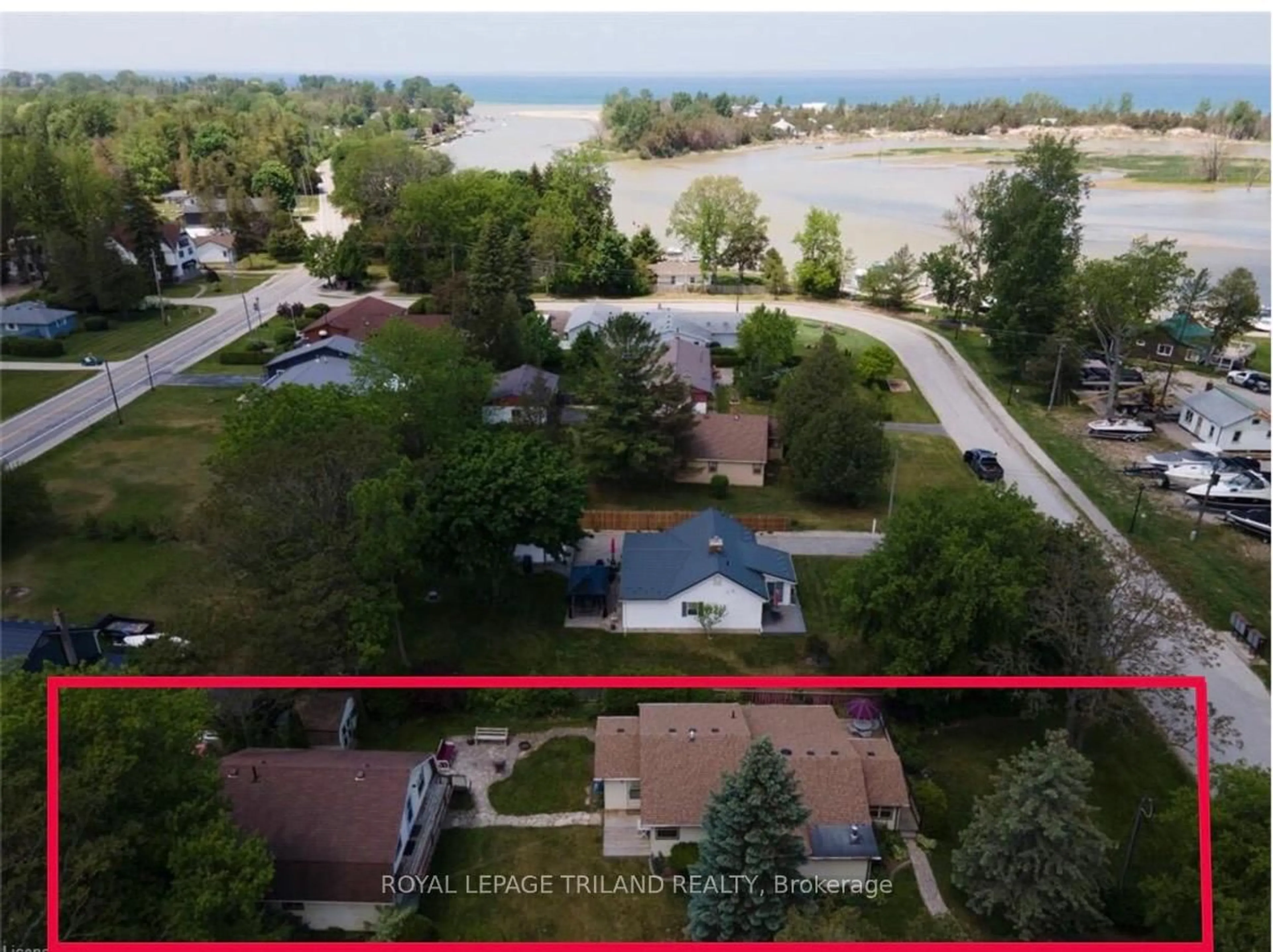 A pic from outside/outdoor area/front of a property/back of a property/a pic from drone, water/lake/river/ocean view for 7575 Biddulph St, Lambton Shores Ontario N0M 2L0
