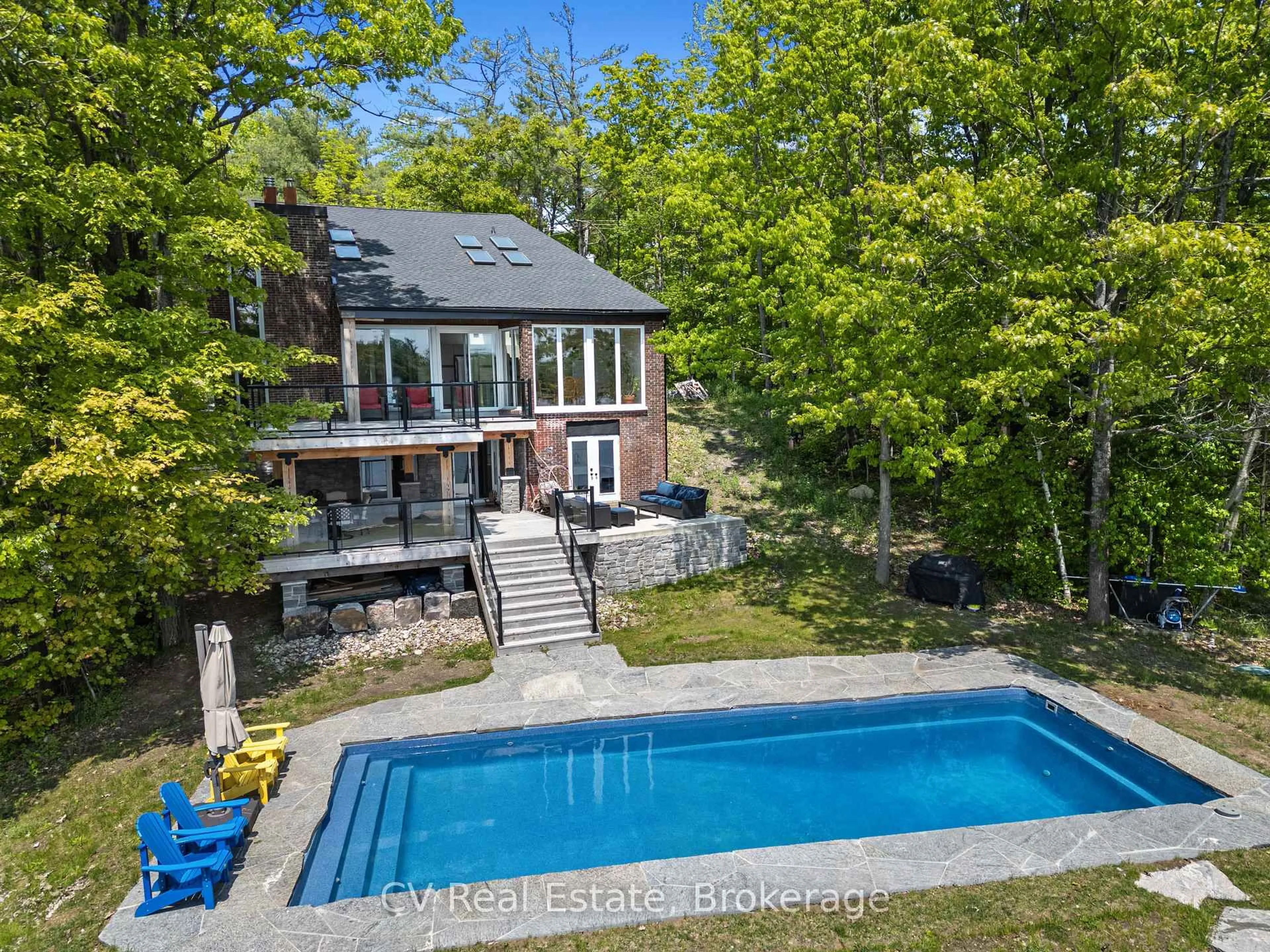 A pic from outside/outdoor area/front of a property/back of a property/a pic from drone, water/lake/river/ocean view for 1030 S Sunset Bay Rd, Gravenhurst Ontario P1P 1R2