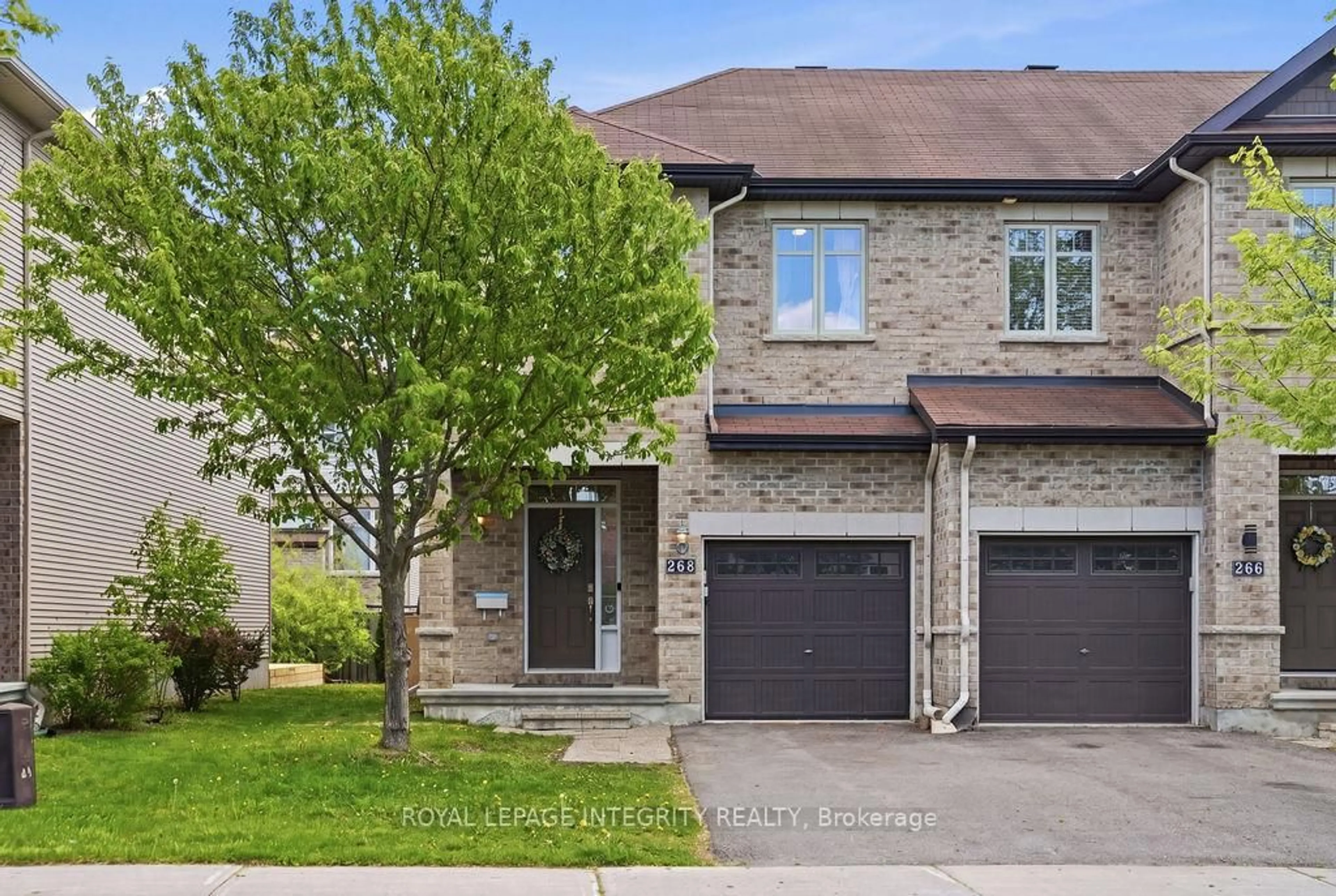 Home with brick exterior material, street for 268 Keyrock Dr, Ottawa Ontario K2T 0G2