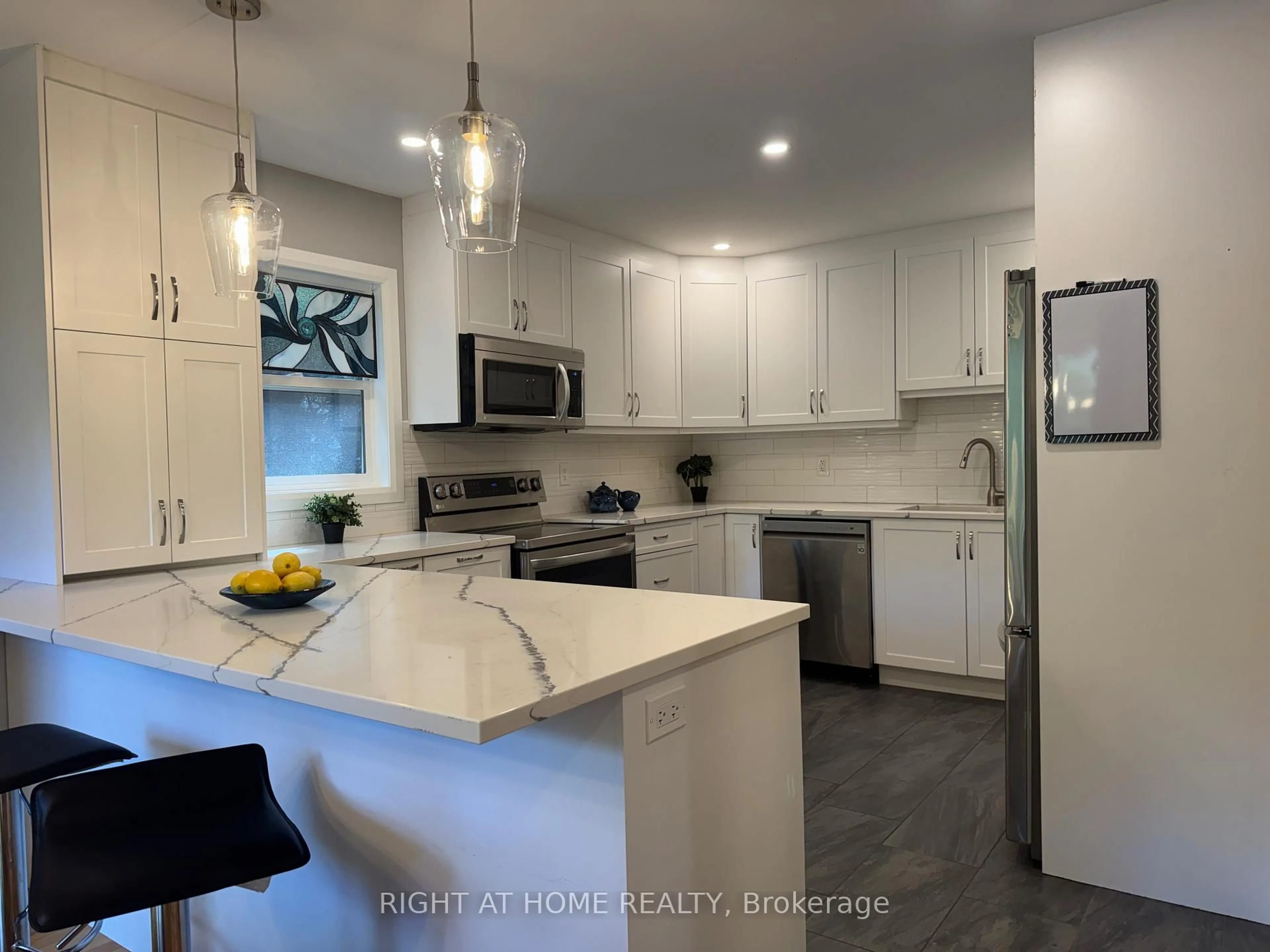 Open concept kitchen, ceramic/tile floor for 3 Pommel Cres, Ottawa Ontario K2M 1A3