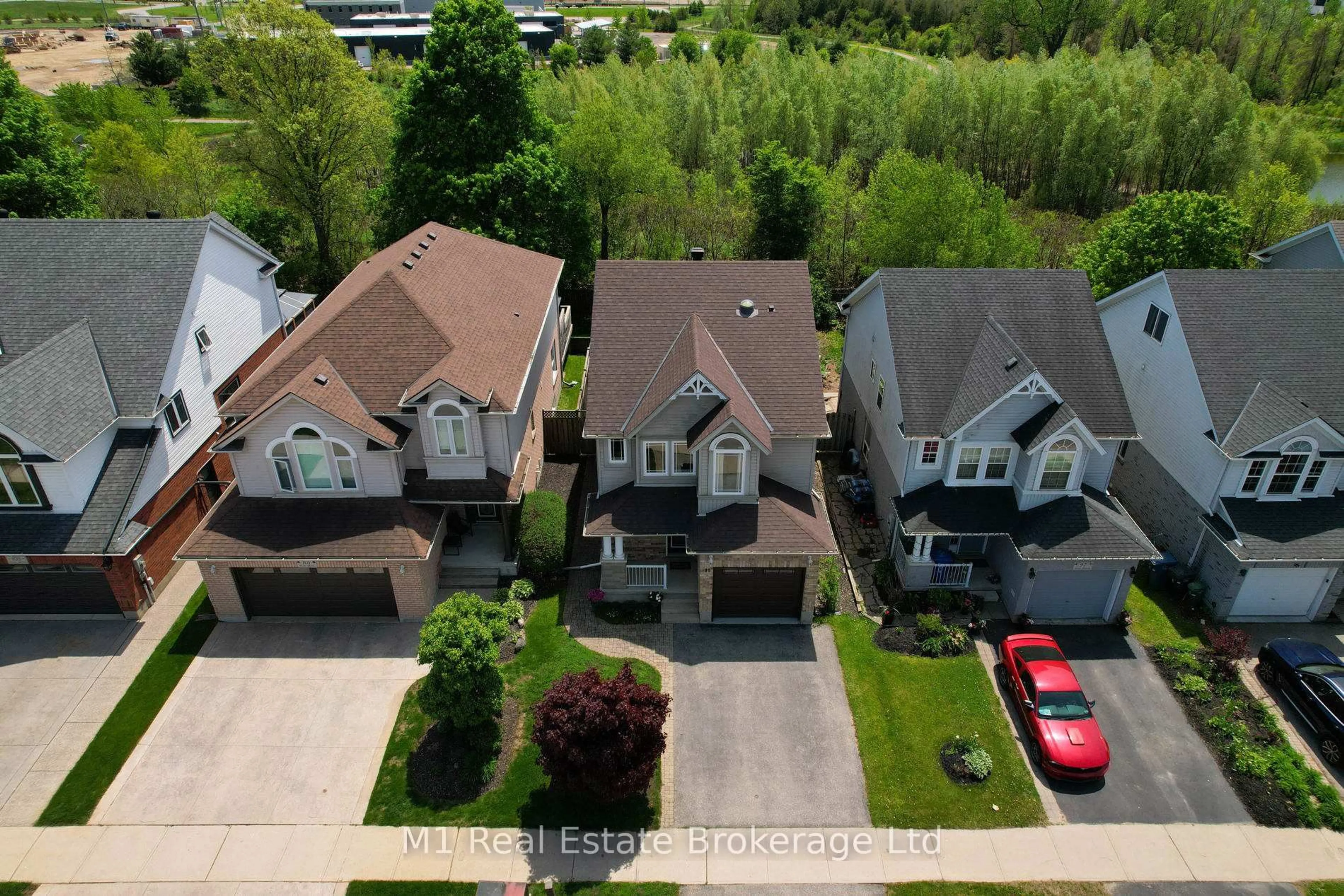A pic from outside/outdoor area/front of a property/back of a property/a pic from drone, street for 99 Teal Dr, Guelph Ontario N1C 1H2
