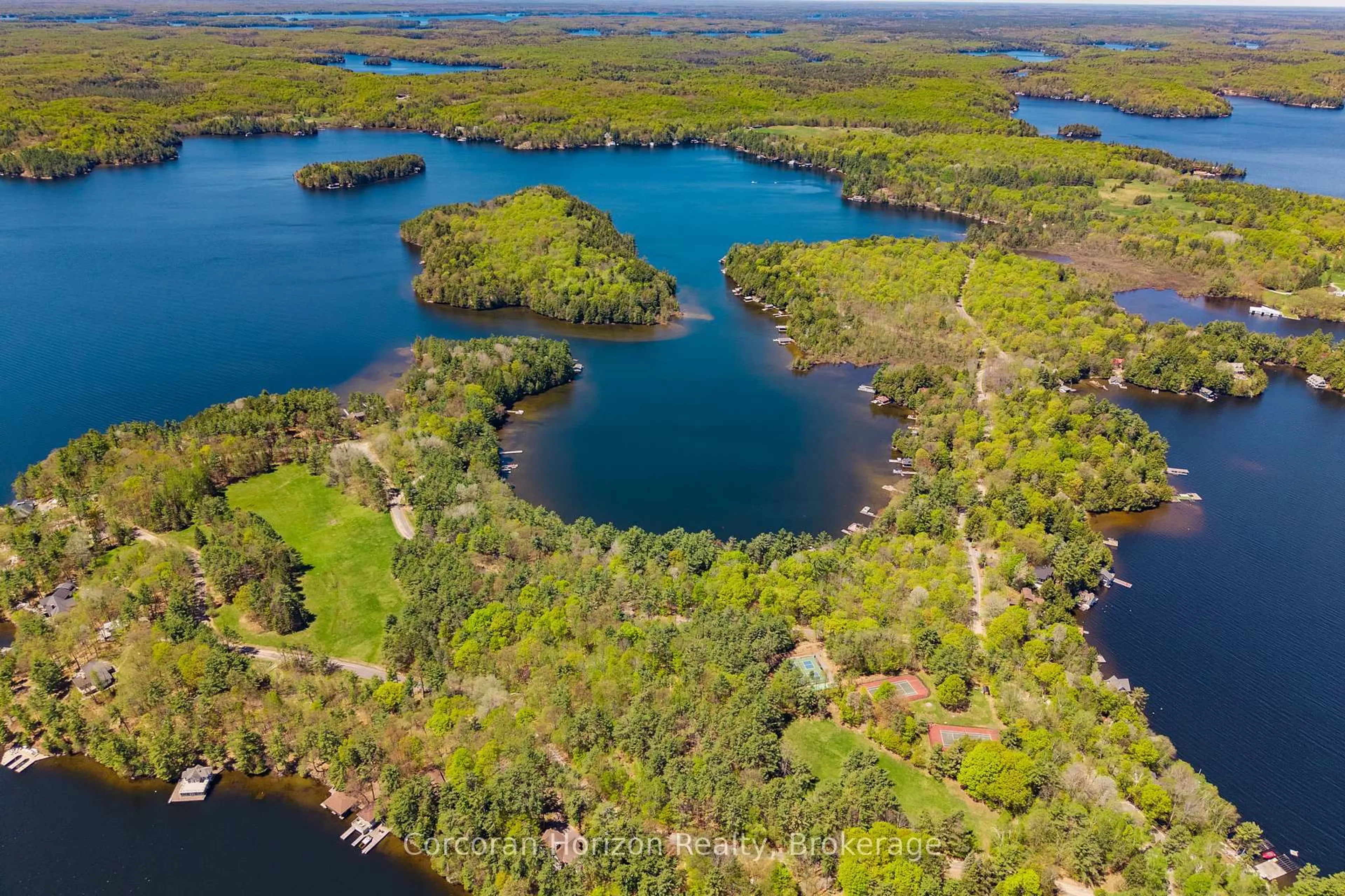 A pic from outside/outdoor area/front of a property/back of a property/a pic from drone, water/lake/river/ocean view for 1050 Fair-Lee Park Rd, Muskoka Lakes Ontario P0B 1G0