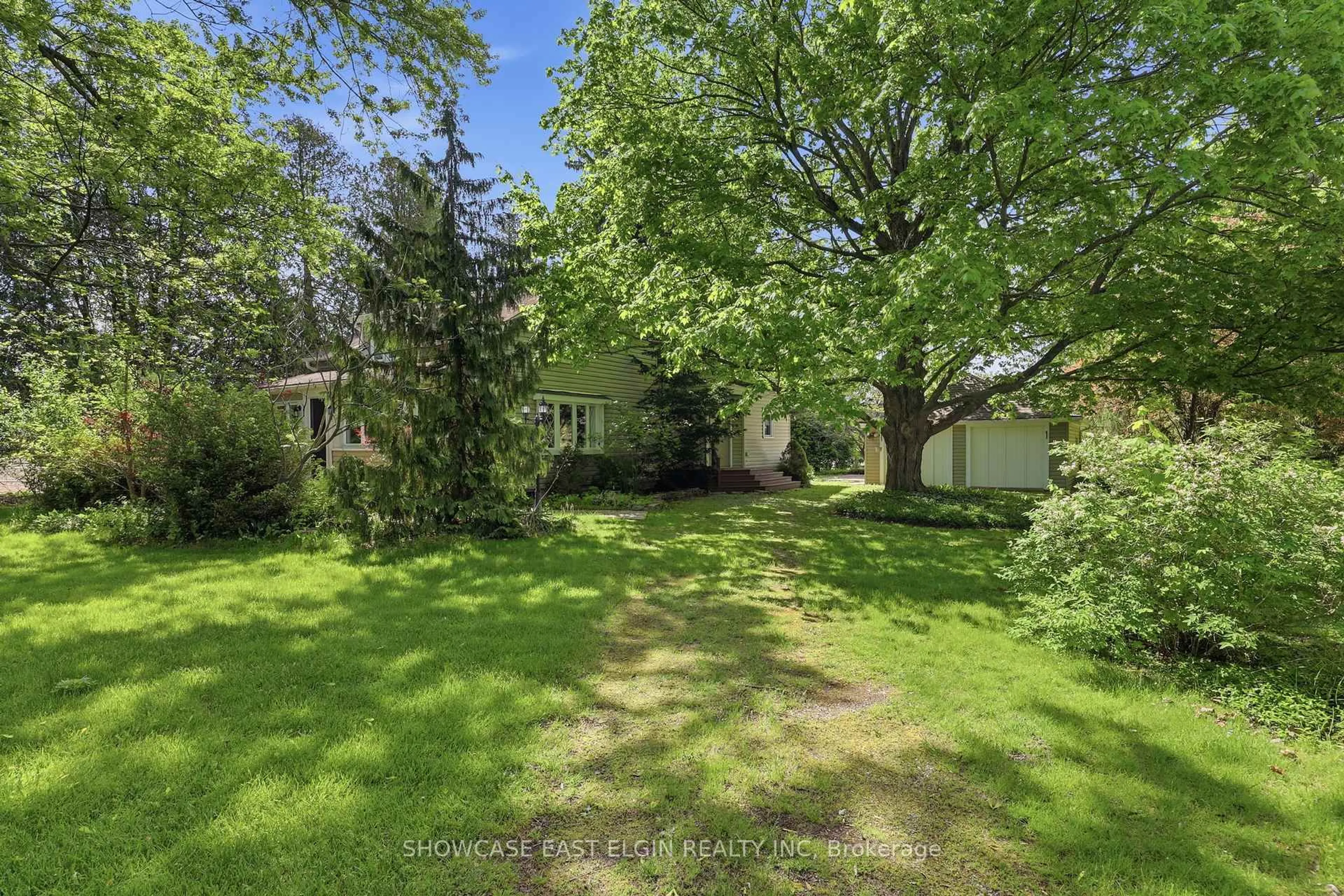 A pic from outside/outdoor area/front of a property/back of a property/a pic from drone, forest/trees view for 48577 Conservation Line, Malahide Ontario N5H 2R4