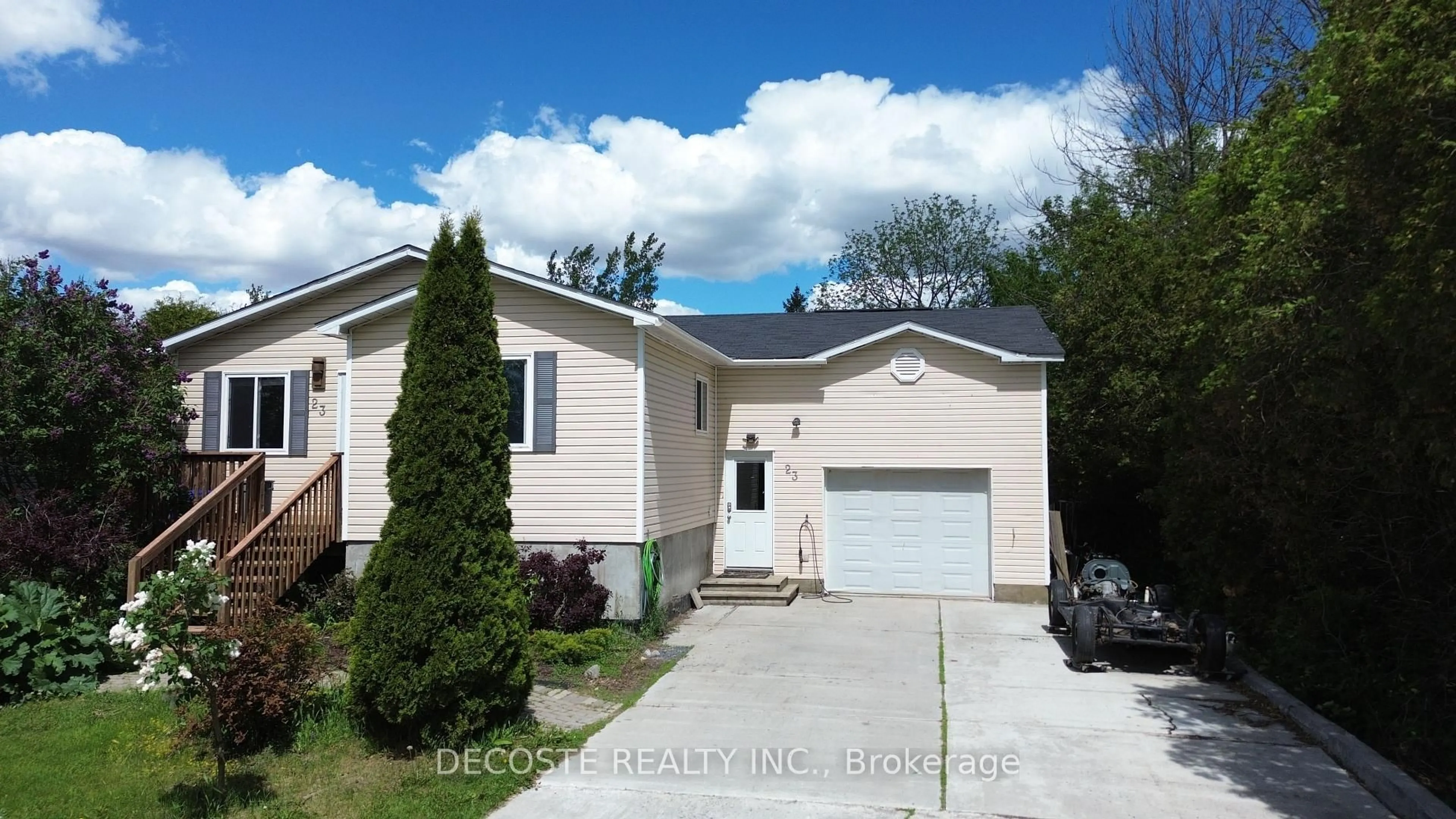 Home with vinyl exterior material, street for 23 Wood St, South Glengarry Ontario K0C 1N0