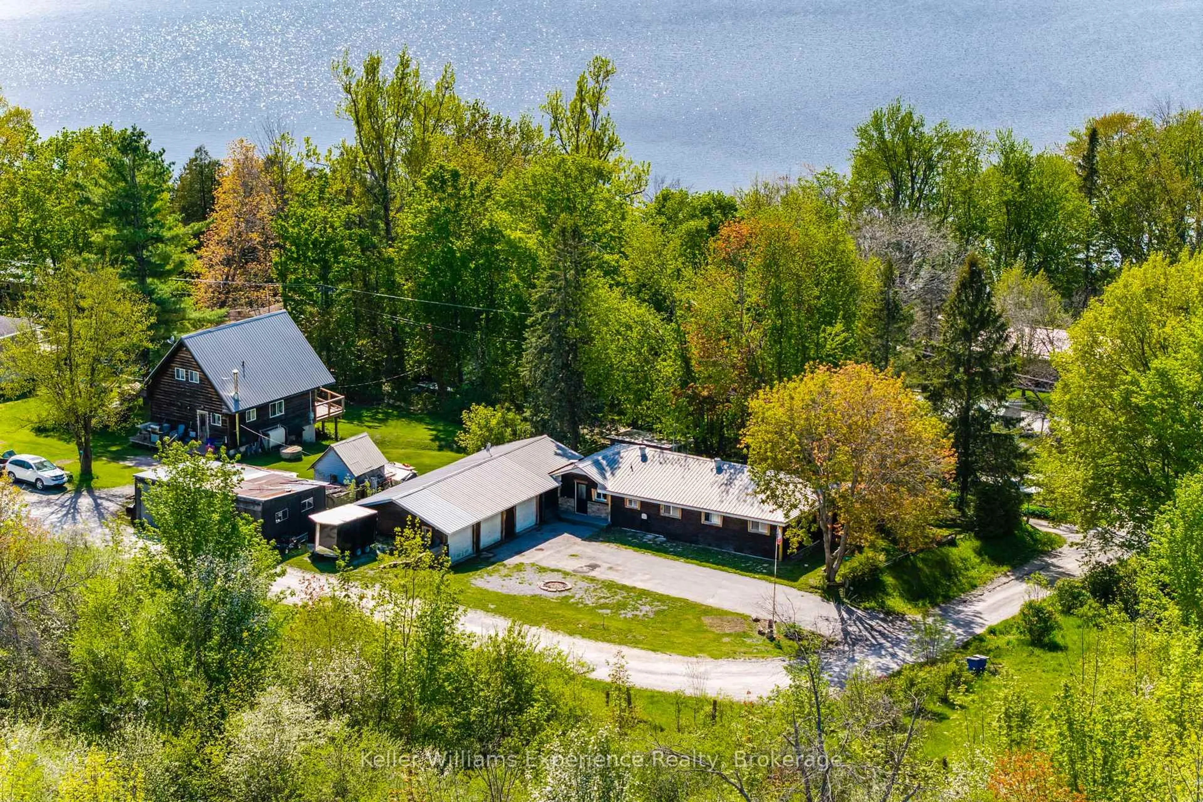 A pic from outside/outdoor area/front of a property/back of a property/a pic from drone, water/lake/river/ocean view for 8 Robins Lane, Kawartha Lakes Ontario L0K 1W0