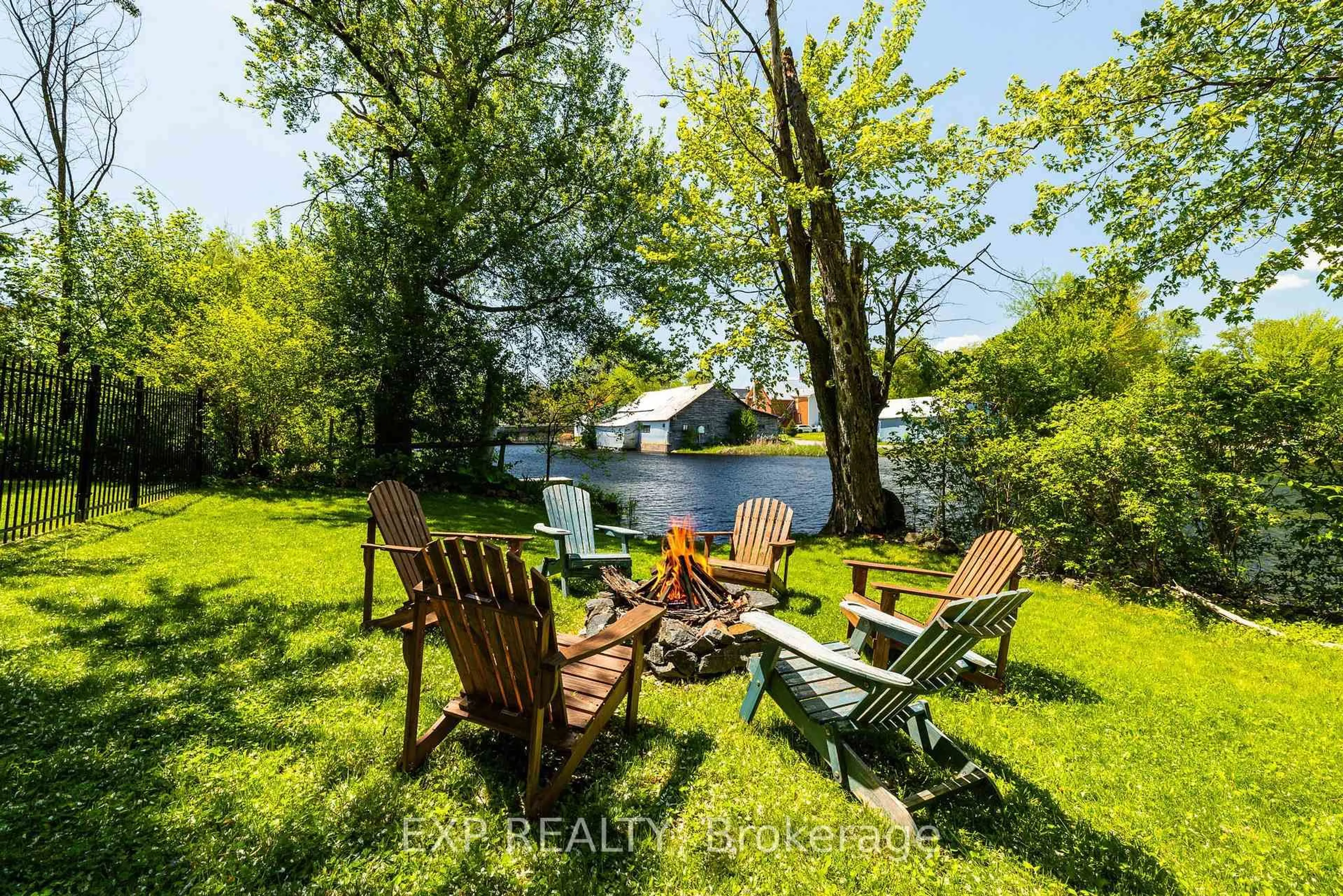 A pic from outside/outdoor area/front of a property/back of a property/a pic from drone, water/lake/river/ocean view for 85 South St, Lanark Ontario K0G 1K0