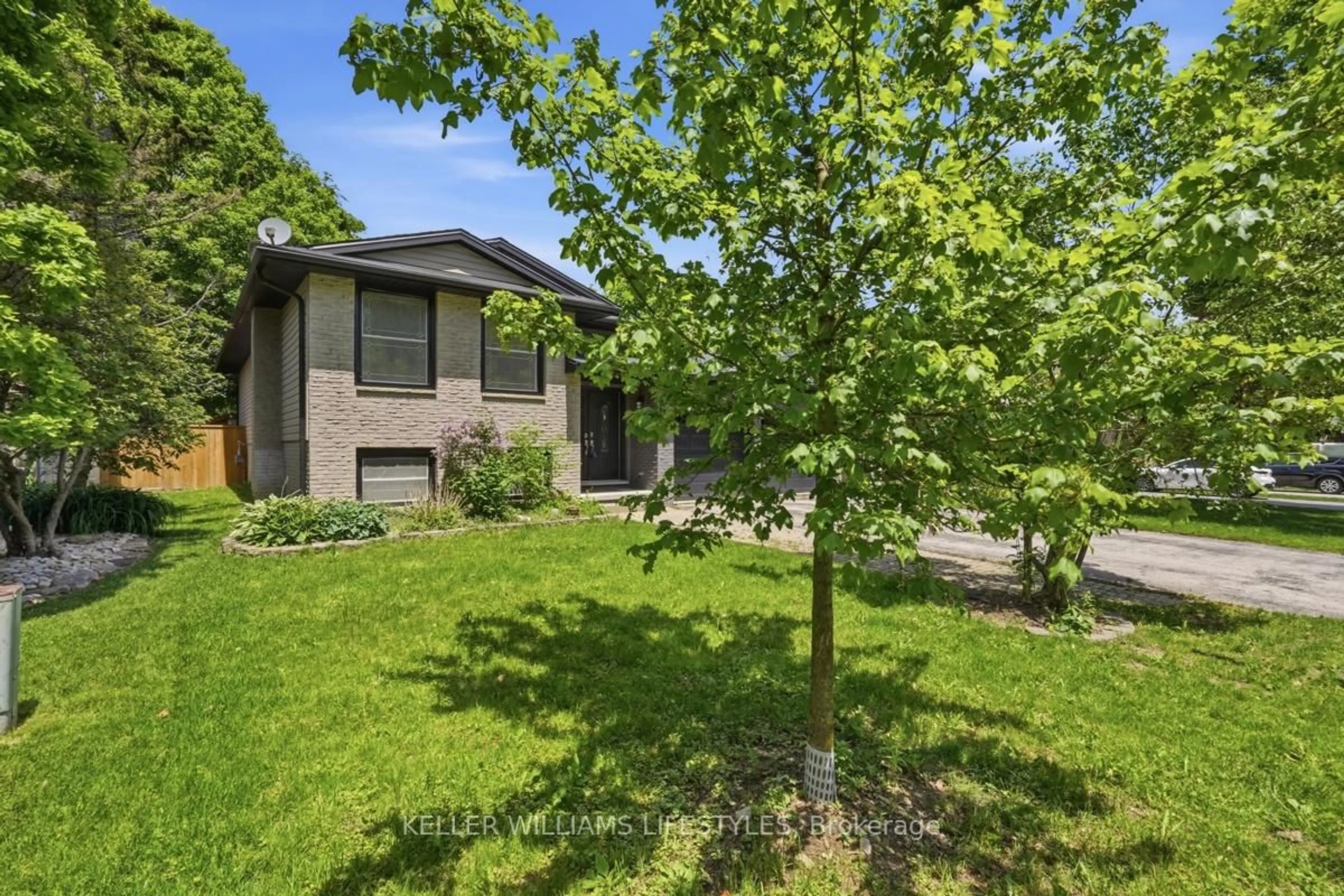 A pic from outside/outdoor area/front of a property/back of a property/a pic from drone, forest/trees view for 18 Fairlane Cres, London South Ontario N6K 3E2