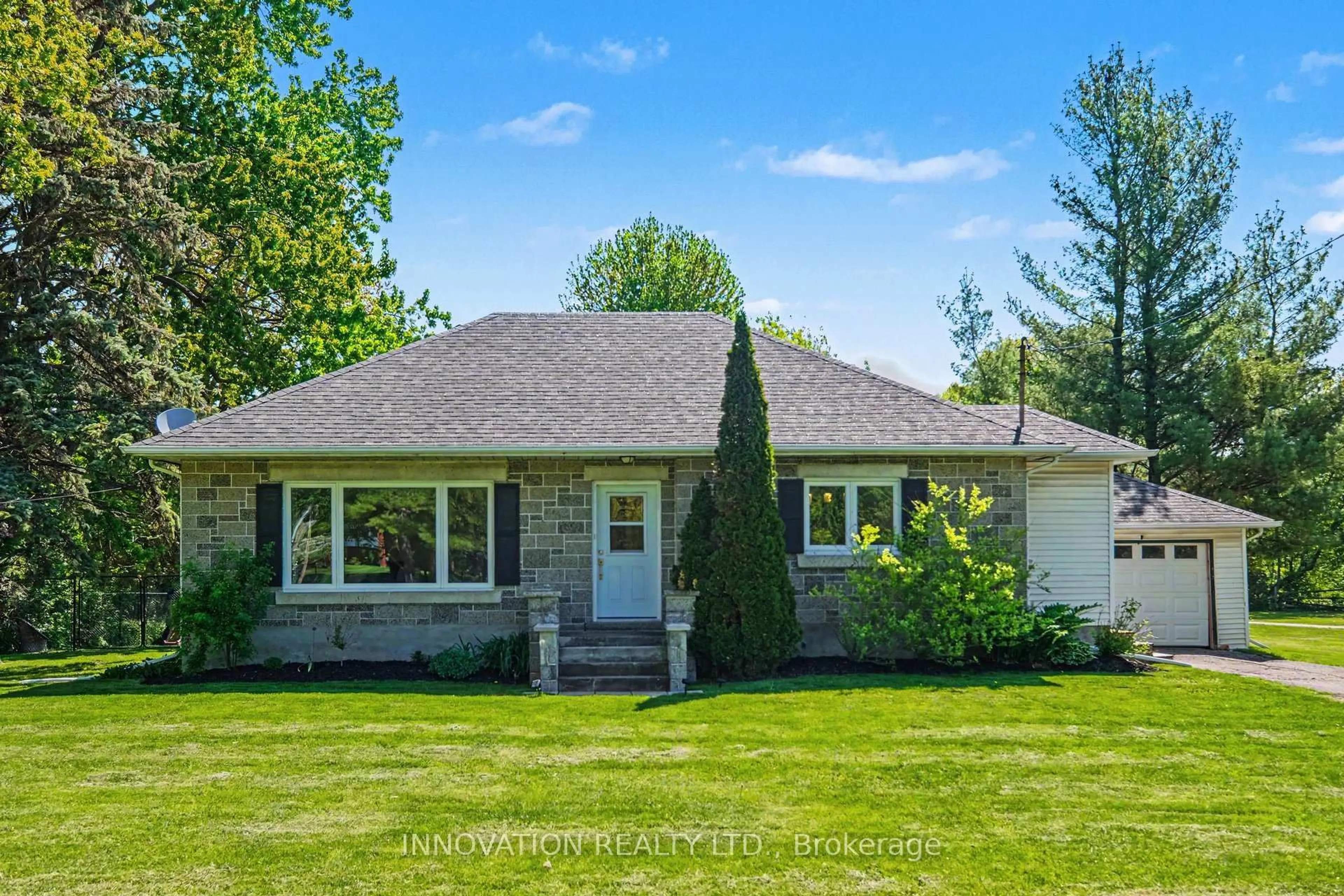 Home with vinyl exterior material, street for 6563 Prince Of Wales Dr, North Gower Ontario K0A 2T0