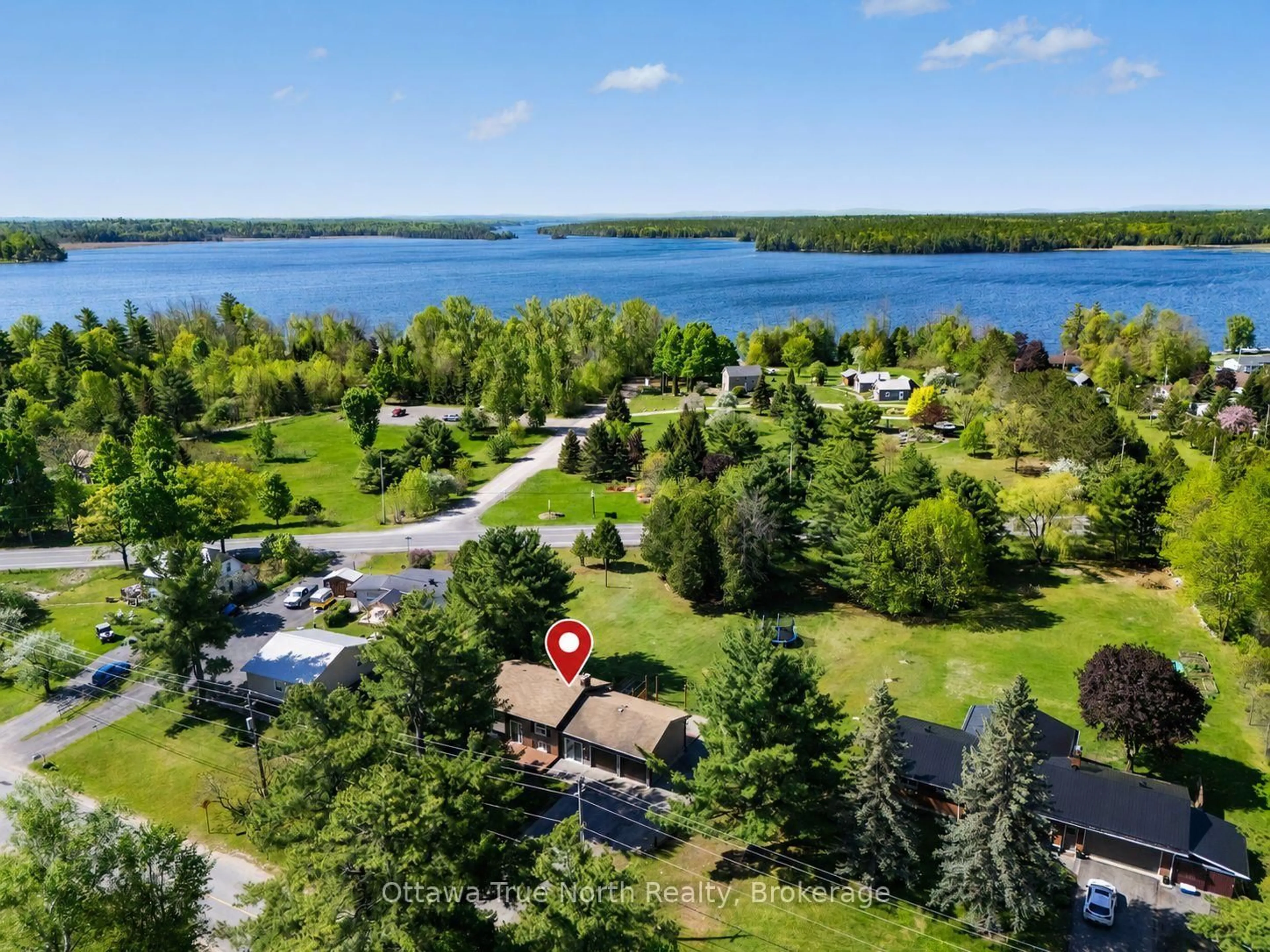 A pic from outside/outdoor area/front of a property/back of a property/a pic from drone, water/lake/river/ocean view for 541 McLachlan Rd, White Lake Ontario K0A 3L0