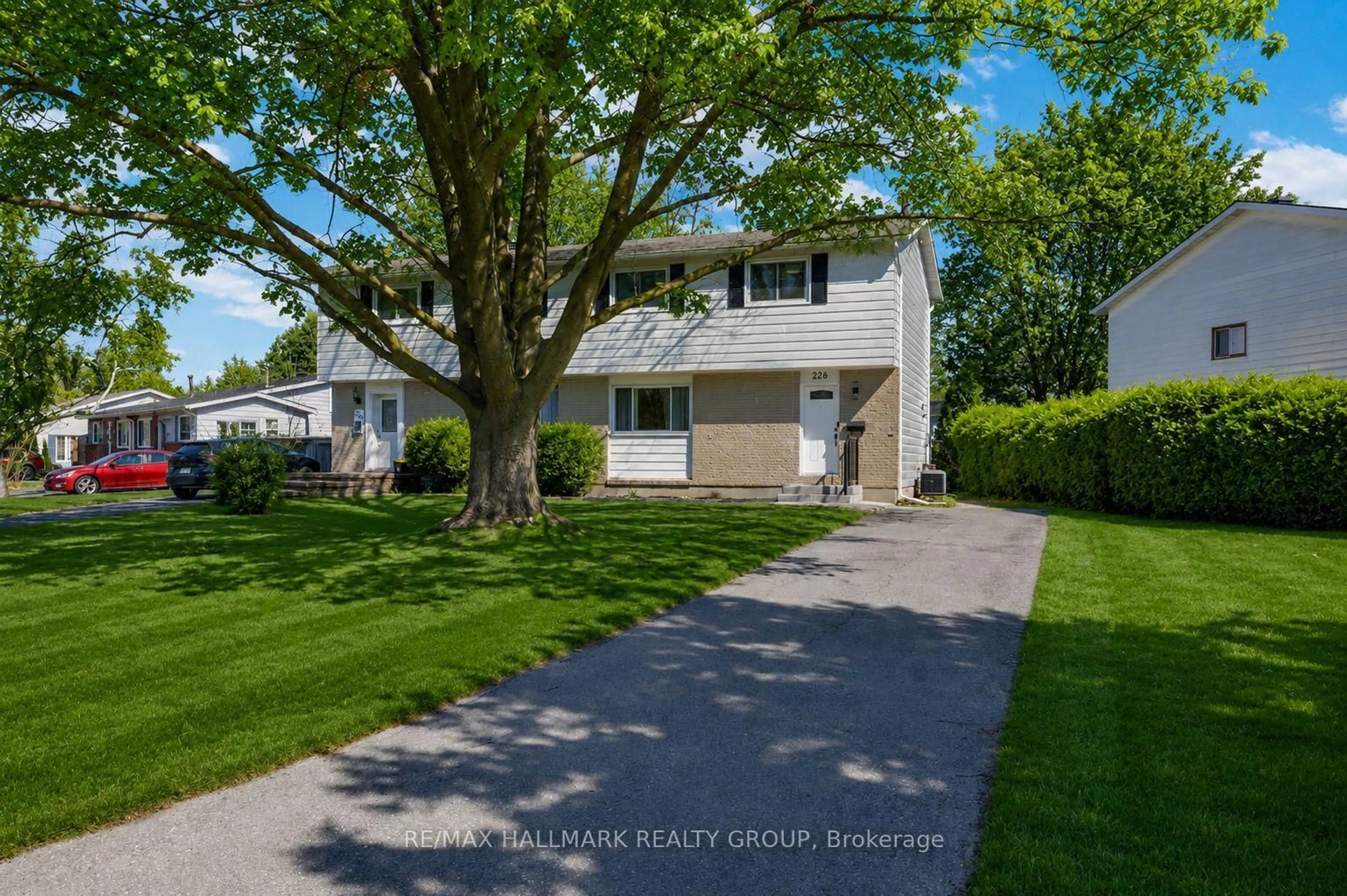 Home with vinyl exterior material, street for 226 Old Colony Rd, Ottawa Ontario K2L 1M7