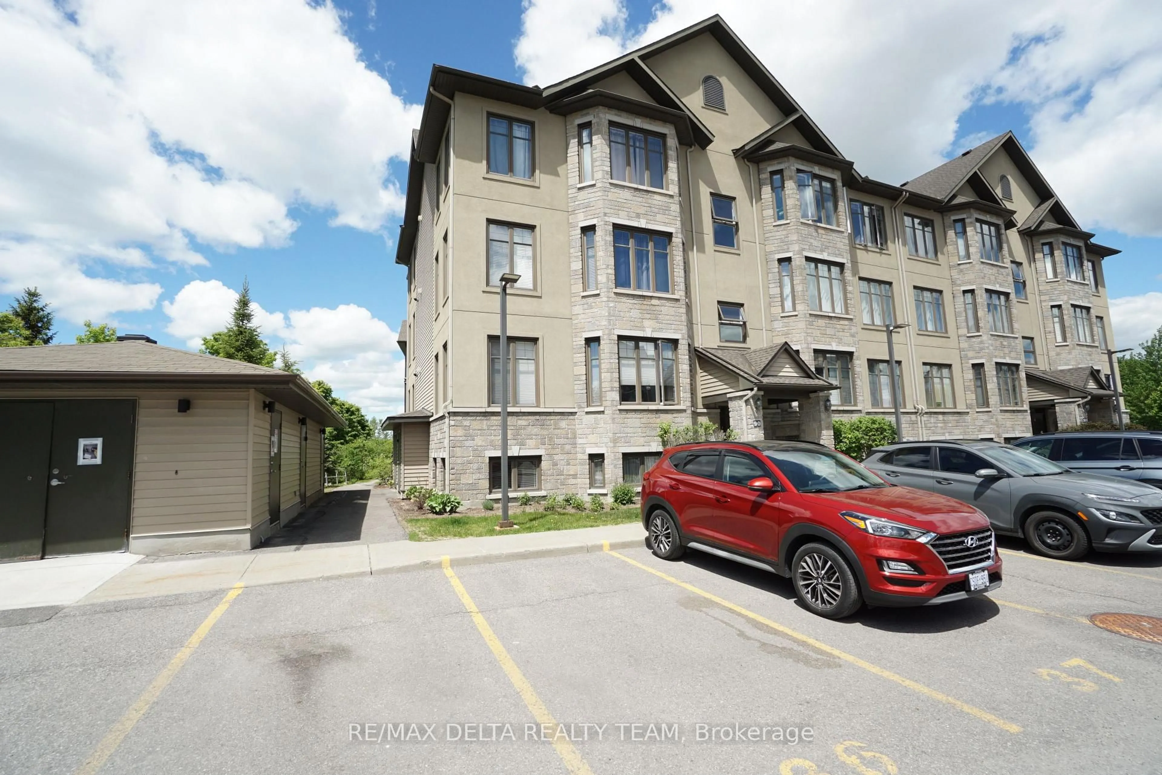 A pic from outside/outdoor area/front of a property/back of a property/a pic from drone, building for 90 Prestige Circ #7, Ottawa Ontario K4A 0Y1