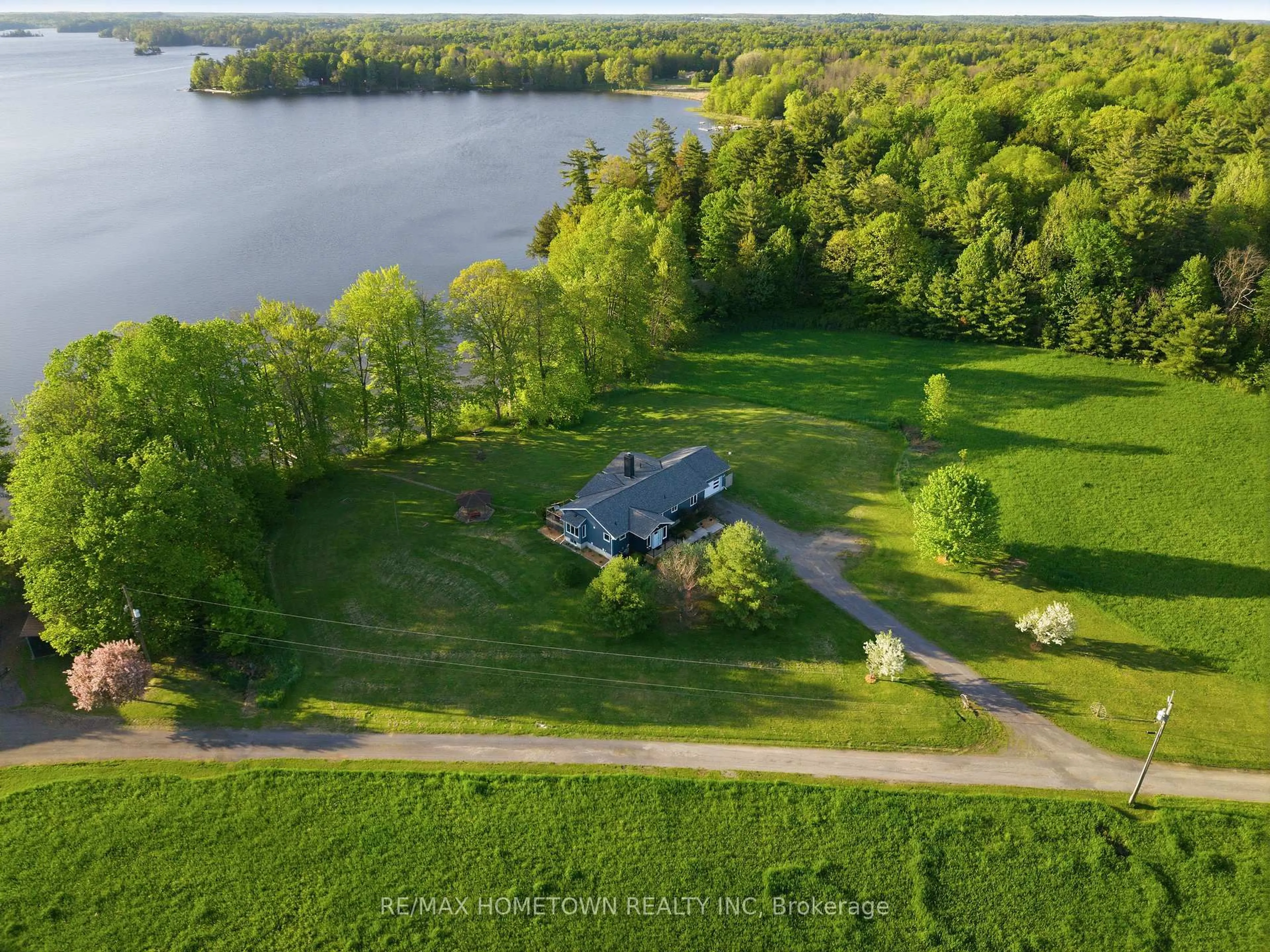 A pic from outside/outdoor area/front of a property/back of a property/a pic from drone, water/lake/river/ocean view for 594 Lyndhurst Rd, Leeds and the Thousand Islands Ontario K0E 1N0