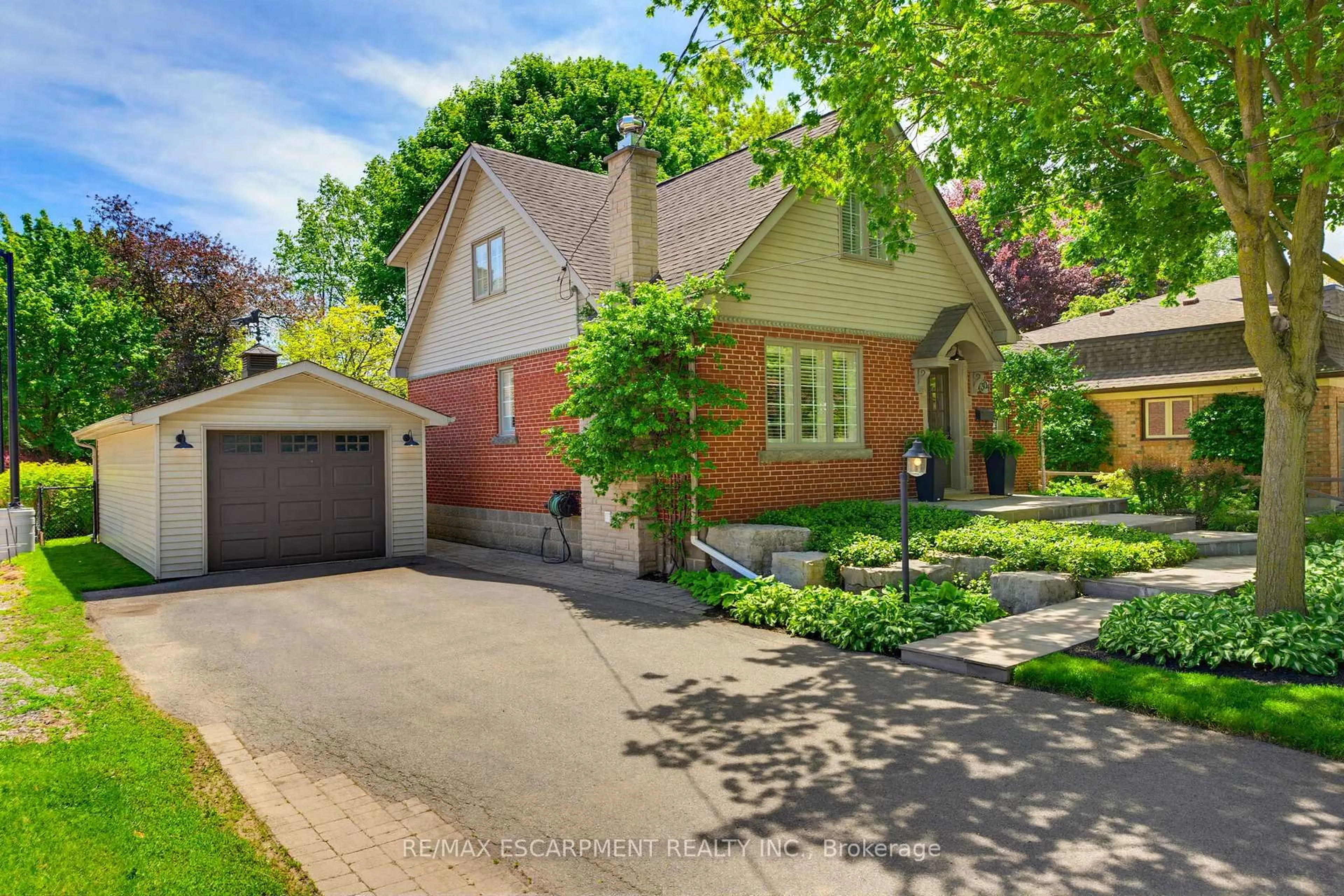 Home with brick exterior material, street for 304 Parkside Dr, Hamilton Ontario L0R 2H0