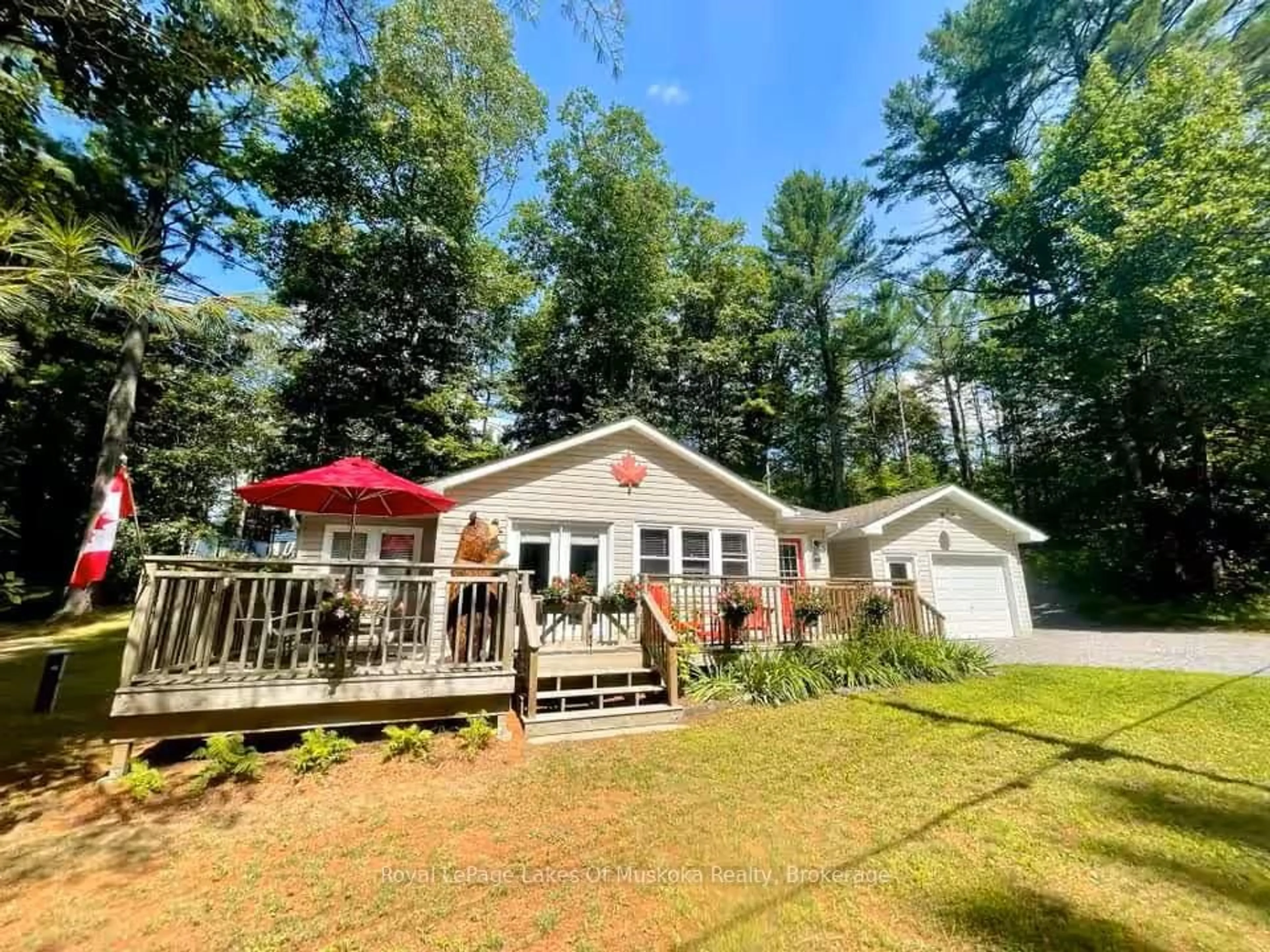 A pic from outside/outdoor area/front of a property/back of a property/a pic from drone, water/lake/river/ocean view for 886 Muskoka 10 Rd, Huntsville Ontario P0B 1L0