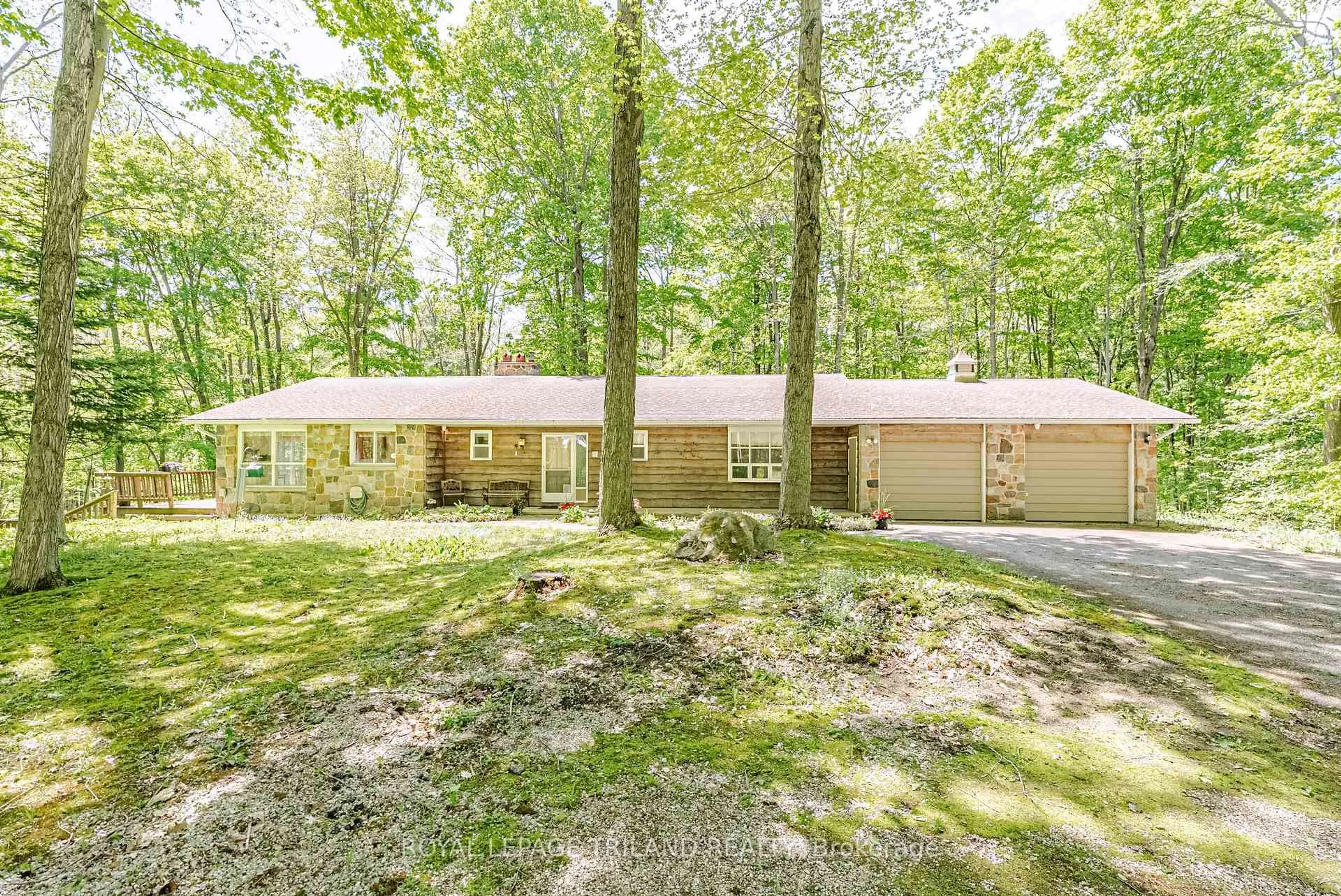 A pic from outside/outdoor area/front of a property/back of a property/a pic from drone, forest/trees view for 1591 Elgin Rd, Thames Centre Ontario N0L 1G6
