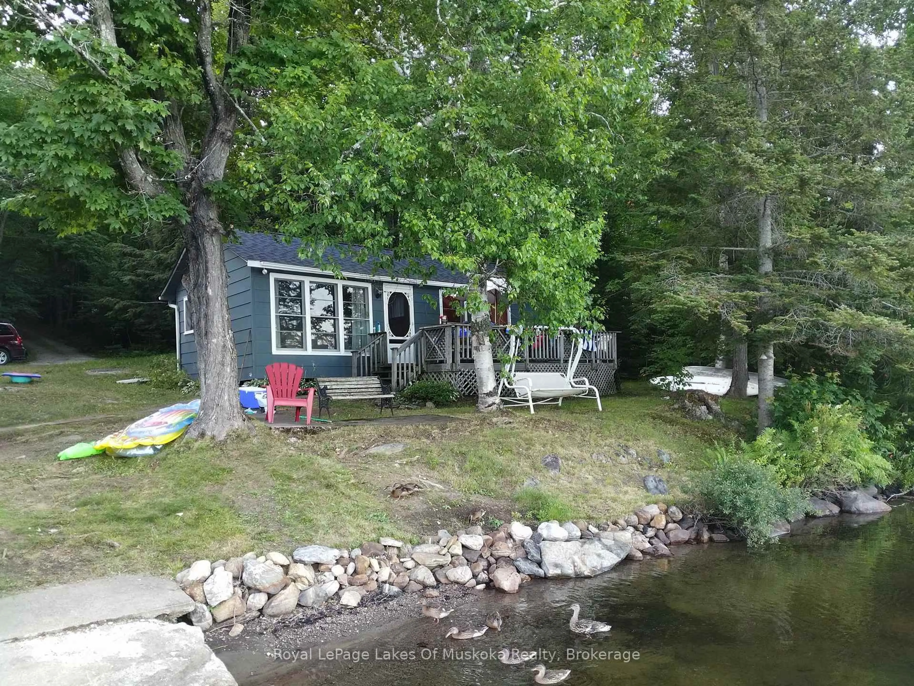 A pic from outside/outdoor area/front of a property/back of a property/a pic from drone, water/lake/river/ocean view for 25 Maple Dr, Perry Ontario P0A 1J0